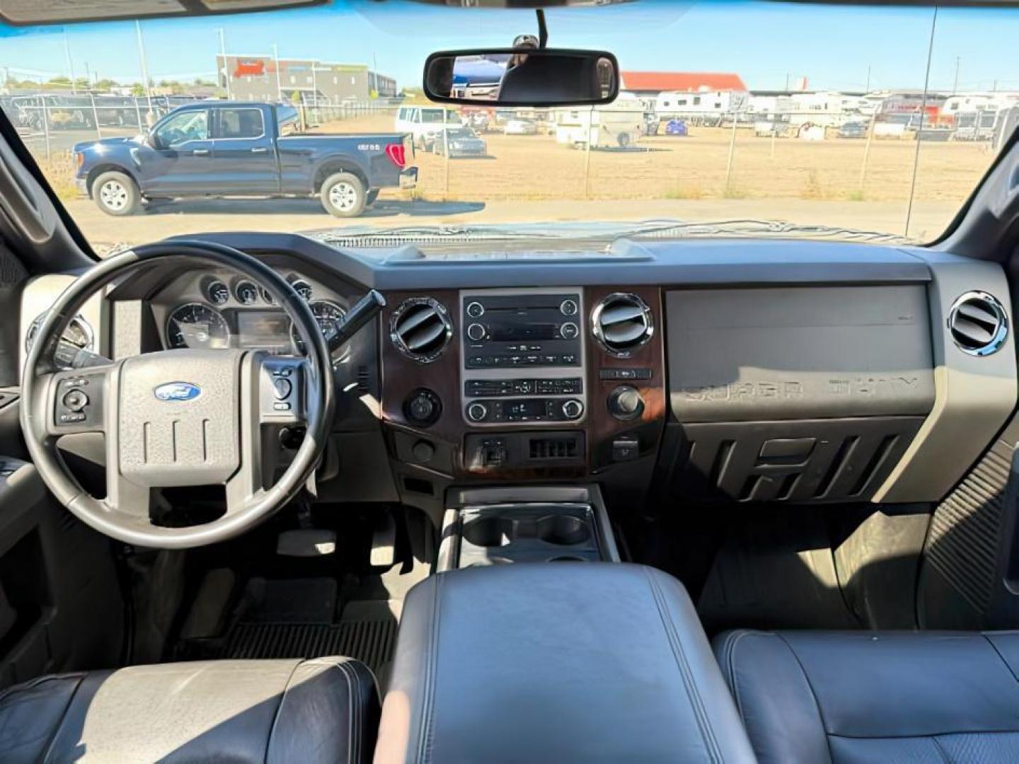 2012 GRAY /CLOTH Ford F-350 SD (1FT8W3BT1CE) with an 67L V8 OHV 16V DIESEL engine, Automatic transmission, located at 1175 N Woodruff Ave, Idaho Falls, ID, 83401, 43.506901, -111.999657 - At Timberline Auto, finding a great deal on your next vehicle is always easy! Our experienced sales staff's goal is to help find you the right vehicle at the right price! Our knowledgeable finance department has options for almost any credit score. We offer extended service contract options to prote - Photo#17