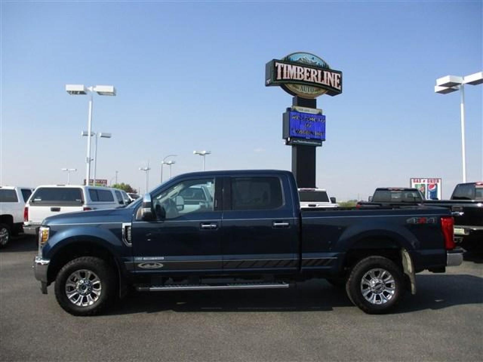 2019 BLUE /BLACK FORD F250 LARIAT (1FT7W2BT2KE) with an 8 engine, Automatic transmission, located at 1580 E Lincoln Rd, Idaho Falls, ID, 83401, (208) 523-4000, 0.000000, 0.000000 - LARIAT PACKAGE. HARD TO FIND ROYAL BLUE PAINT COLOR. NEWER TIRES WITH 90%+ TREAD. HEATED AND COOLED SEATS. REAR HEATED SEATS. REMOTE START. REMOTE TAILGATE. BACK UP CAMERA. EXHAUST BRAKE. TRAILER BRAKE. LOCKING REAR DIFF. B and O PREMIUM SOUND. PEDAL ADJUST. 6.7L POWERSTROKE- 4WD- CREW CAB- STAN - Photo #2