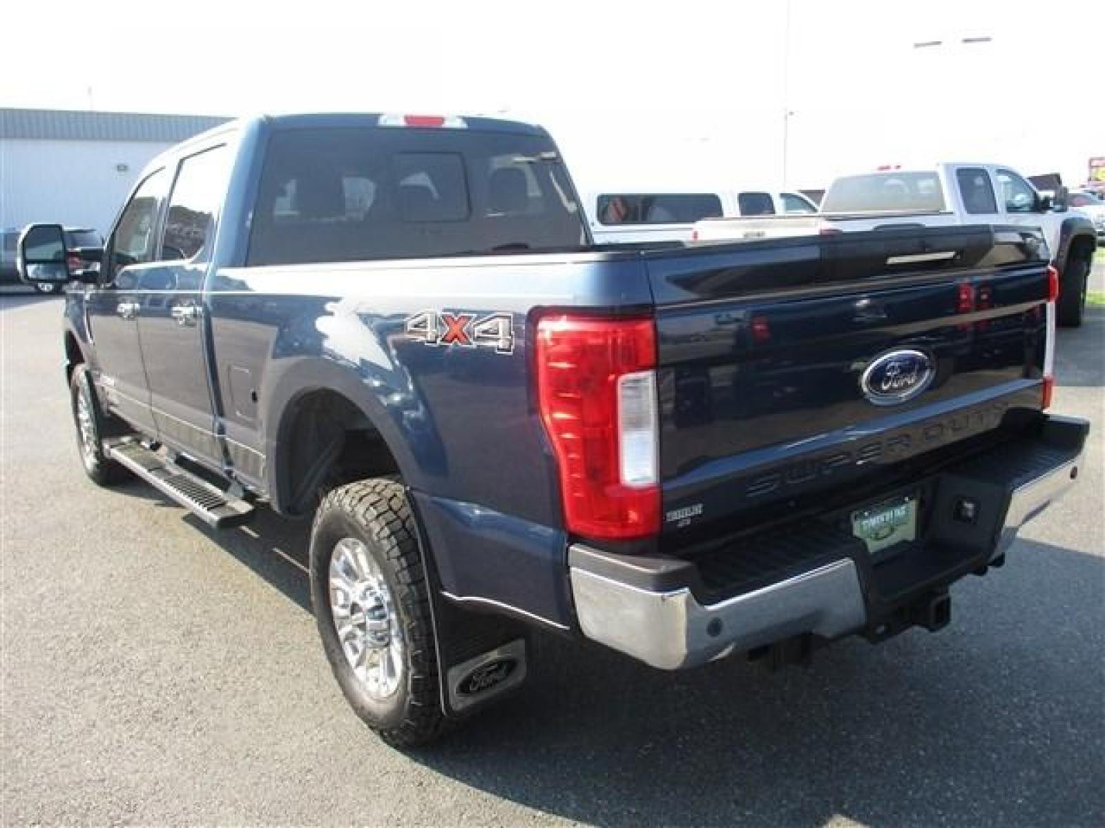 2019 BLUE /BLACK FORD F250 LARIAT (1FT7W2BT2KE) with an 8 engine, Automatic transmission, located at 1580 E Lincoln Rd, Idaho Falls, ID, 83401, (208) 523-4000, 0.000000, 0.000000 - LARIAT PACKAGE. HARD TO FIND ROYAL BLUE PAINT COLOR. NEWER TIRES WITH 90%+ TREAD. HEATED AND COOLED SEATS. REAR HEATED SEATS. REMOTE START. REMOTE TAILGATE. BACK UP CAMERA. EXHAUST BRAKE. TRAILER BRAKE. LOCKING REAR DIFF. B and O PREMIUM SOUND. PEDAL ADJUST. 6.7L POWERSTROKE- 4WD- CREW CAB- STAN - Photo #3