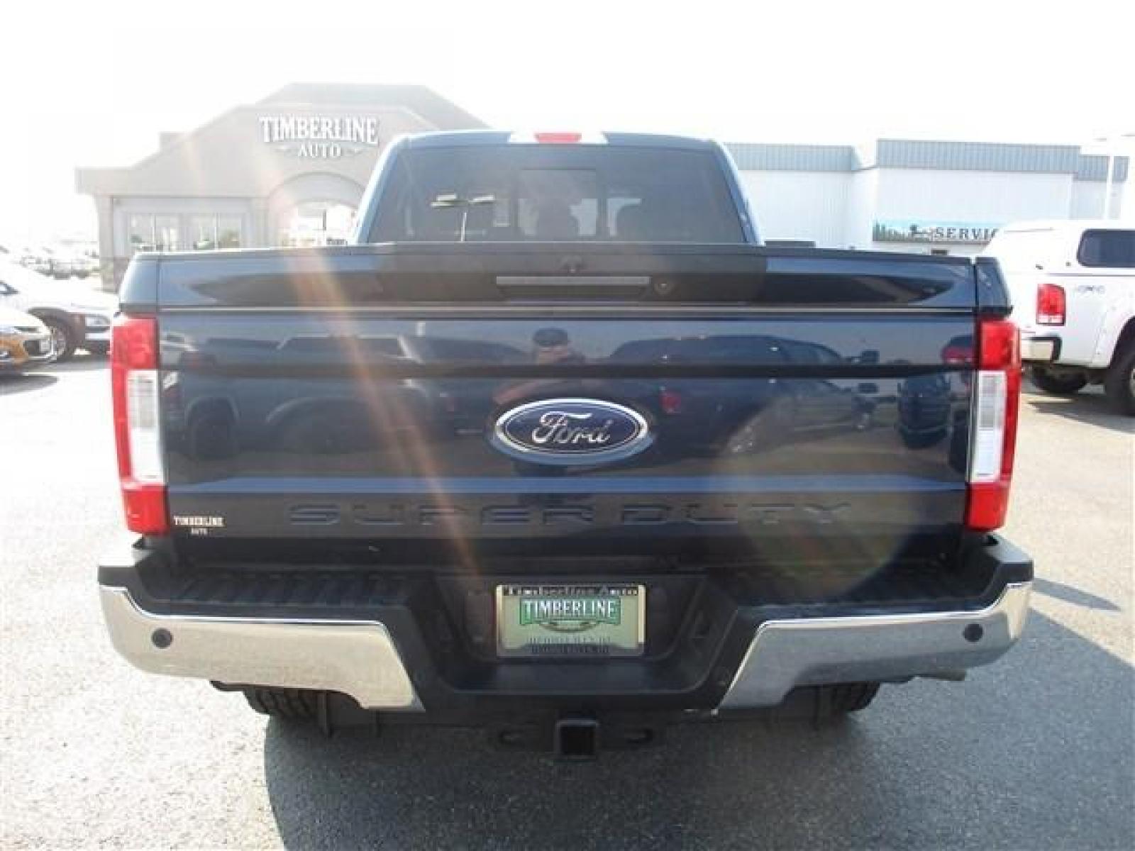 2019 BLUE /BLACK FORD F250 LARIAT (1FT7W2BT2KE) with an 8 engine, Automatic transmission, located at 1580 E Lincoln Rd, Idaho Falls, ID, 83401, (208) 523-4000, 0.000000, 0.000000 - LARIAT PACKAGE. HARD TO FIND ROYAL BLUE PAINT COLOR. NEWER TIRES WITH 90%+ TREAD. HEATED AND COOLED SEATS. REAR HEATED SEATS. REMOTE START. REMOTE TAILGATE. BACK UP CAMERA. EXHAUST BRAKE. TRAILER BRAKE. LOCKING REAR DIFF. B and O PREMIUM SOUND. PEDAL ADJUST. 6.7L POWERSTROKE- 4WD- CREW CAB- STAN - Photo #4