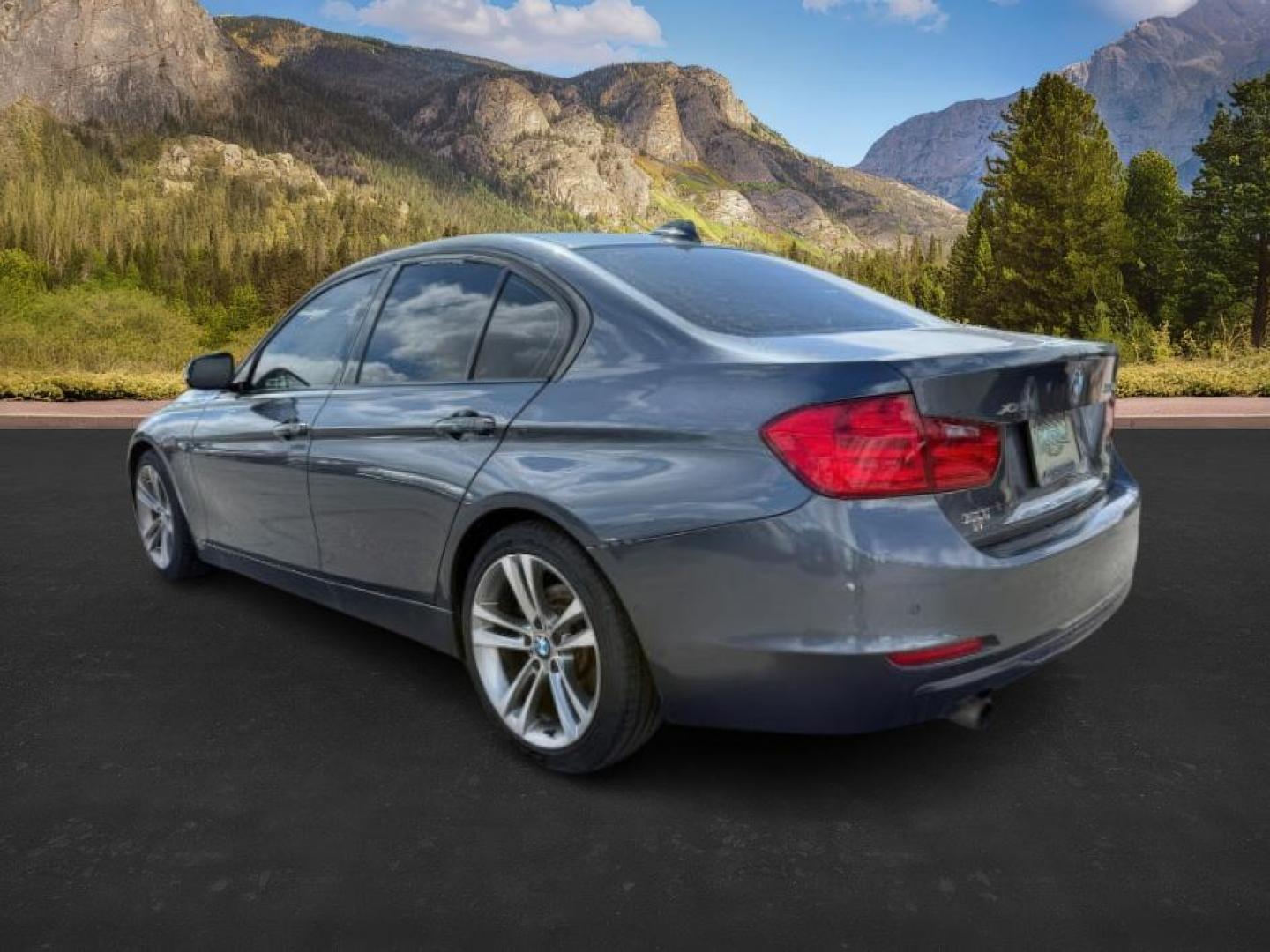 2014 GRAY /BLACK BMW 3 SERIES xDrive (WBA3C3C59EF) with an 2L I-4 gasoline direct injection engine, AUTOMATIC transmission, located at 1235 N Woodruff Ave., Idaho Falls, 83401, (208) 523-1053, 43.507172, -112.000488 - At Timberline Auto, finding a great deal on your next vehicle is always easy! Our experienced sales staff's goal is to help find you the right vehicle at the right price! Our knowledgeable finance department has options for almost any credit score. We offer extended service contract options to prote - Photo#2