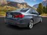 2014 GRAY /BLACK BMW 3 SERIES xDrive (WBA3C3C59EF) with an 2L I-4 gasoline direct injection engine, AUTOMATIC transmission, located at 1235 N Woodruff Ave., Idaho Falls, 83401, (208) 523-1053, 43.507172, -112.000488 - At Timberline Auto, finding a great deal on your next vehicle is always easy! Our experienced sales staff's goal is to help find you the right vehicle at the right price! Our knowledgeable finance department has options for almost any credit score. We offer extended service contract options to prote - Photo#4
