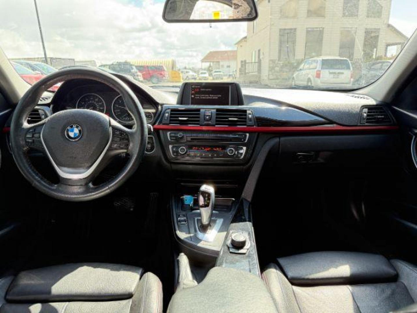 2014 GRAY /BLACK BMW 3 SERIES xDrive (WBA3C3C59EF) with an 2L I-4 gasoline direct injection engine, AUTOMATIC transmission, located at 1235 N Woodruff Ave., Idaho Falls, 83401, (208) 523-1053, 43.507172, -112.000488 - At Timberline Auto, finding a great deal on your next vehicle is always easy! Our experienced sales staff's goal is to help find you the right vehicle at the right price! Our knowledgeable finance department has options for almost any credit score. We offer extended service contract options to prote - Photo#16