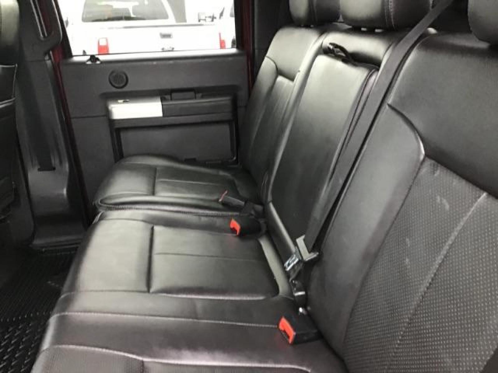 2012 MAROON /Black Leather Interior Ford F-350 SD Lariat Crew Cab 4WD (1FT8W3BTXCE) with an 6.7L V8 OHV 16V DIESEL engine, 6-Speed Automatic transmission, located at 1235 N Woodruff Ave., Idaho Falls, 83401, (208) 523-1053, 43.507172, -112.000488 - Photo #20