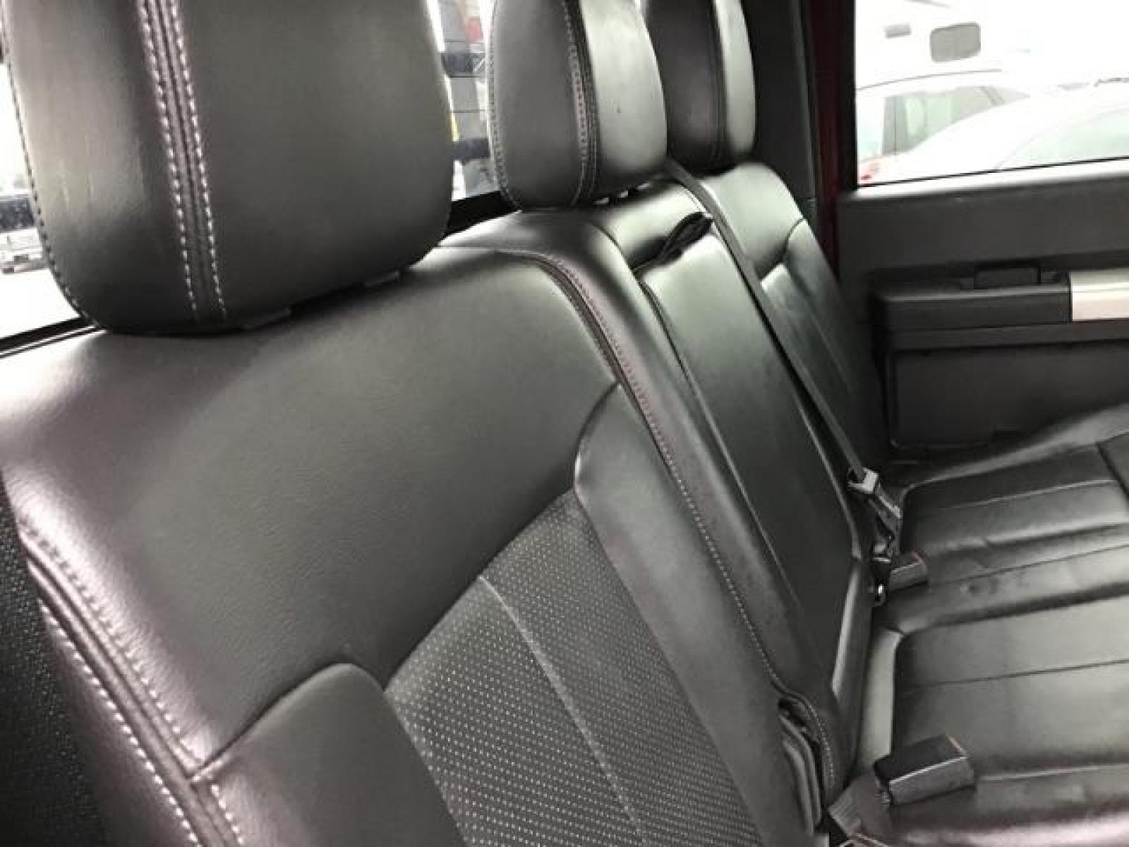 2012 MAROON /Black Leather Interior Ford F-350 SD Lariat Crew Cab 4WD (1FT8W3BTXCE) with an 6.7L V8 OHV 16V DIESEL engine, 6-Speed Automatic transmission, located at 1235 N Woodruff Ave., Idaho Falls, 83401, (208) 523-1053, 43.507172, -112.000488 - Photo #22