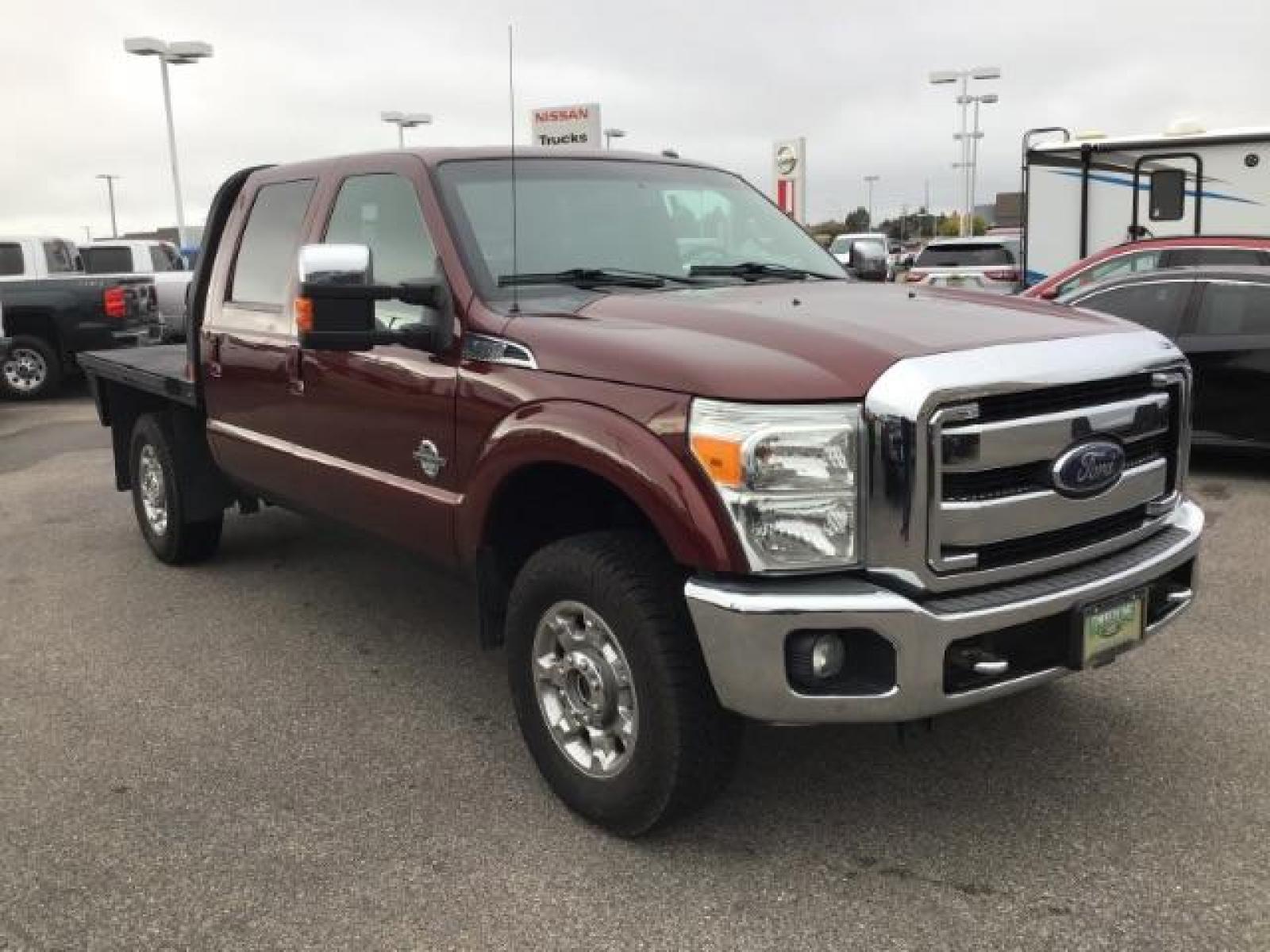 2012 MAROON /Black Leather Interior Ford F-350 SD Lariat Crew Cab 4WD (1FT8W3BTXCE) with an 6.7L V8 OHV 16V DIESEL engine, 6-Speed Automatic transmission, located at 1235 N Woodruff Ave., Idaho Falls, 83401, (208) 523-1053, 43.507172, -112.000488 - Photo #6