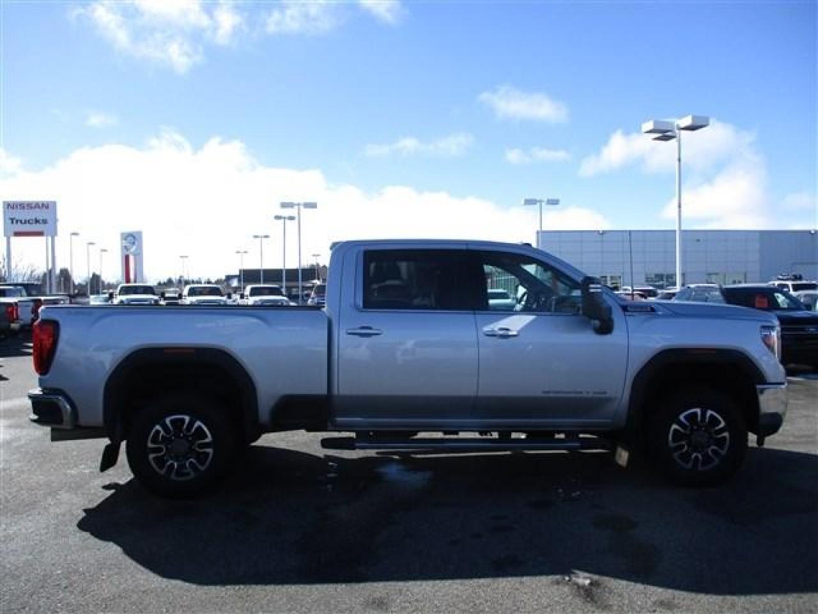 2021 SILVER /BLACK GMC SIERRA 3500 SLE (1GT49TEY3MF) with an 8 engine, Automatic transmission, located at 1580 E Lincoln Rd, Idaho Falls, ID, 83401, (208) 523-4000, 0.000000, 0.000000 - 90%+ TREAD ON HANKOOK DYNAPRO AT2'S. BED LINER WITH FACTORY FIFTH WHEEL PUCK SYSTEM. HEATED CLOTH SEATS. HEATED STEERING WHEEL. BACK UP CAMERA. BODY AND PAINT IN PERFECT CONDITION. 6 SEATER INTERIOR. REMOTE START. REMOTE TAILGATE. EXHAUST BRAKE. TRAILER BACK UP ASSIST. APPLE CAR PLAY. ANDRIOD AUTO. - Photo #6