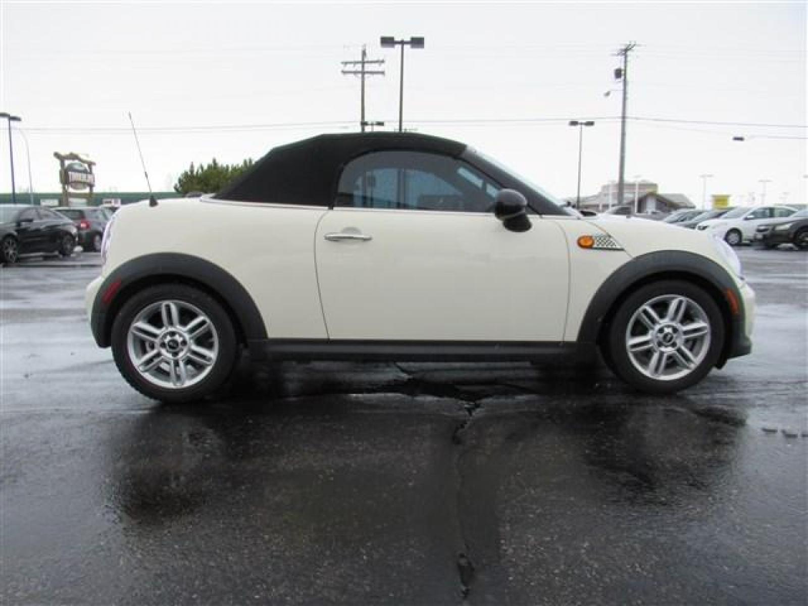 2013 BEIGE /BLACK MINI COOPER ROADSTER (WMWSY1C51DT) with an 4 engine, 6 Speed Manual transmission, located at 1235 N Woodruff Ave., Idaho Falls, 83401, (208) 523-1053, 43.507172, -112.000488 - Photo #5