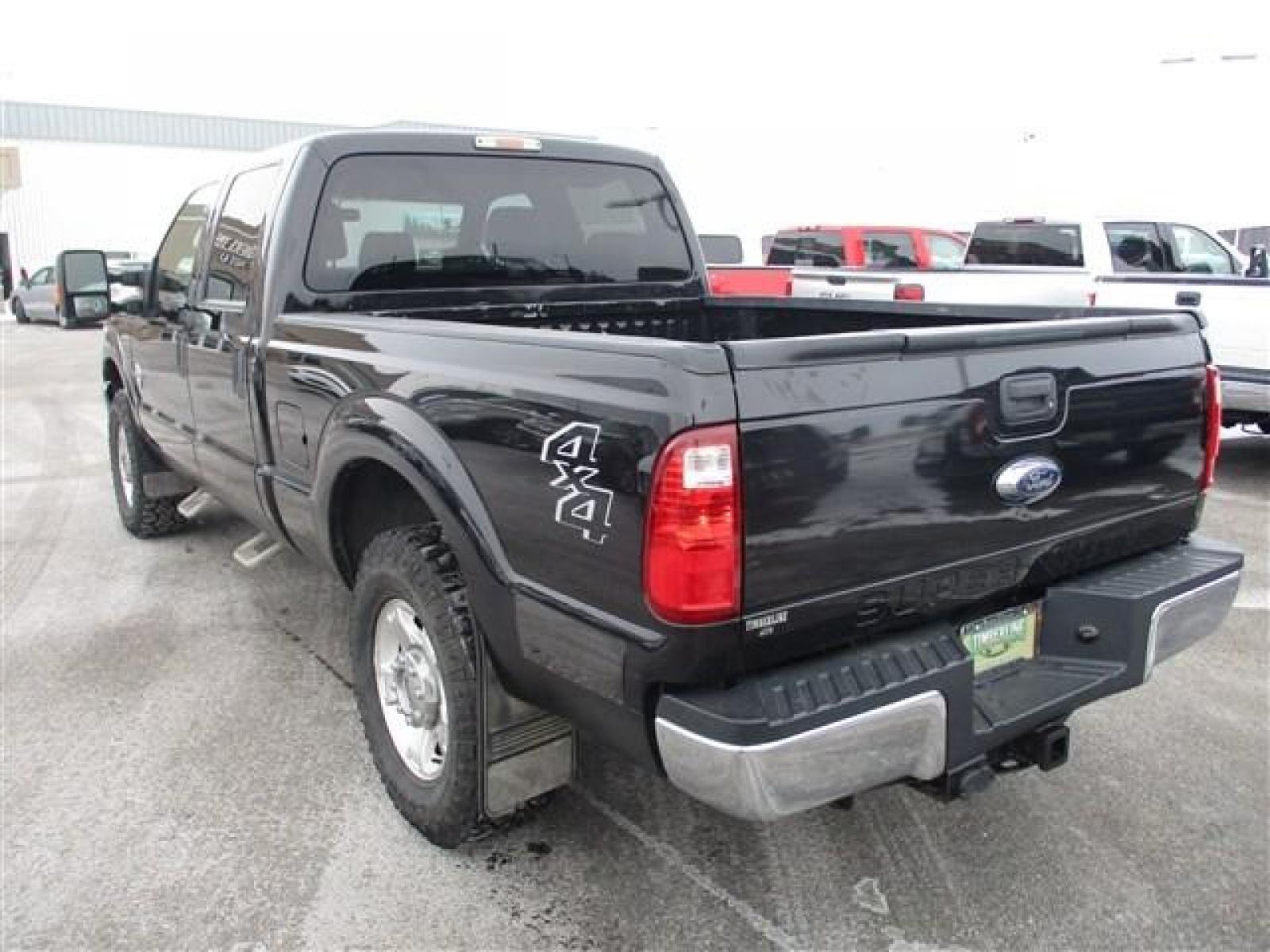 2014 BLACK /BLACK FORD F250 XLT (1FT7W2BT8EE) with an 8 engine, Automatic transmission, located at 1580 E Lincoln Rd, Idaho Falls, ID, 83401, (208) 523-4000, 0.000000, 0.000000 - This 2014 Ford F250 XLT has had some amazing improvements! To start all the cloth seats have been replaced with Lariat leather, the seats have been converted to heated and cooled using OEM parts and controls, a center console was added, an OEM backup camera was installed using the rear view mirror s - Photo #3