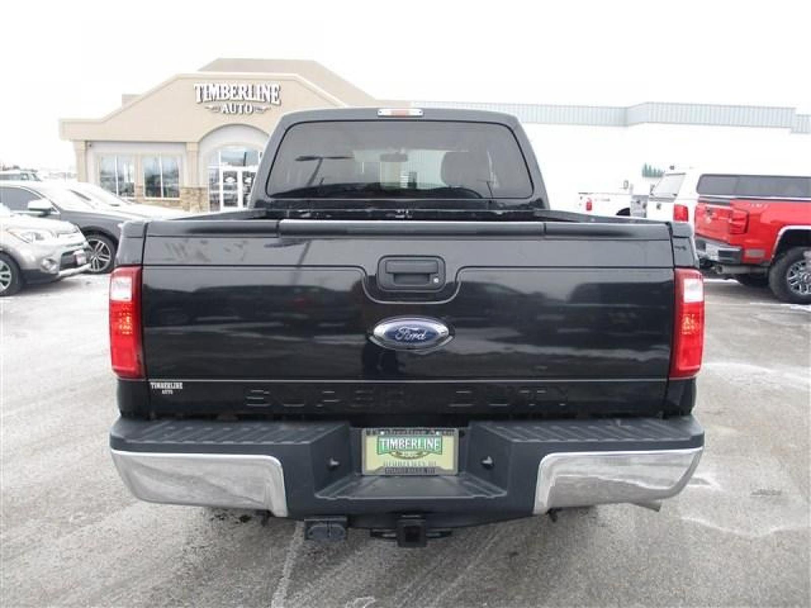 2014 BLACK /BLACK FORD F250 XLT (1FT7W2BT8EE) with an 8 engine, Automatic transmission, located at 1580 E Lincoln Rd, Idaho Falls, ID, 83401, (208) 523-4000, 0.000000, 0.000000 - This 2014 Ford F250 XLT has had some amazing improvements! To start all the cloth seats have been replaced with Lariat leather, the seats have been converted to heated and cooled using OEM parts and controls, a center console was added, an OEM backup camera was installed using the rear view mirror s - Photo #4