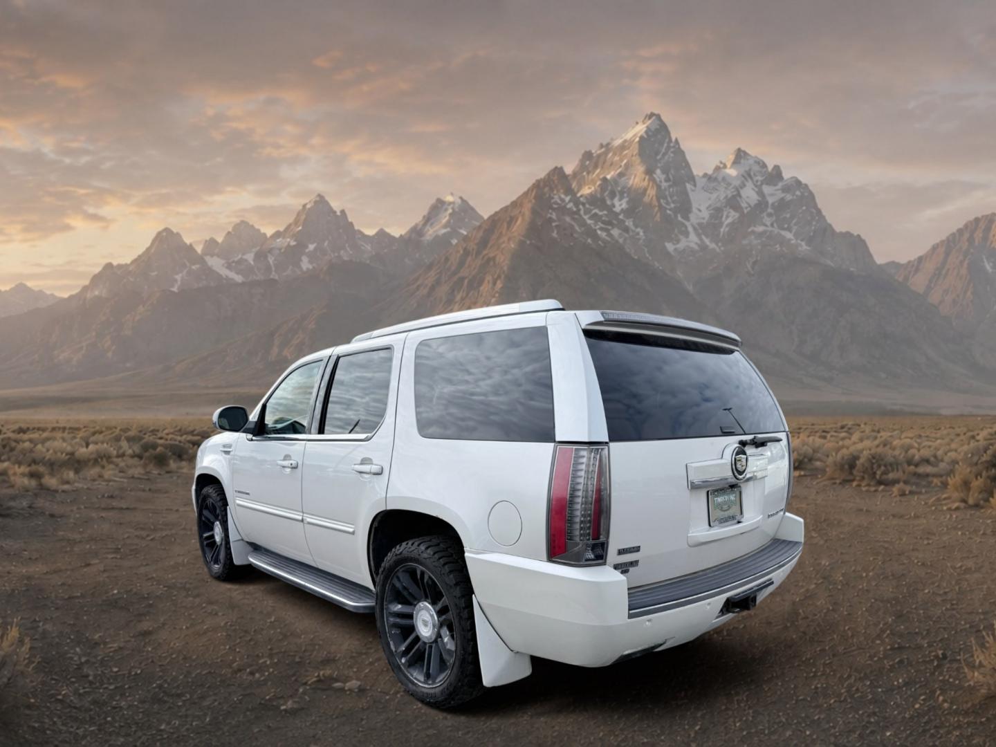 2012 White Diamond Tricoat /Ebony/Ebony Accents Cadillac Escalade Luxury (1GYS4BEF2CR) with an V8, 6.2L engine, 6-Speed Automatic transmission, located at 1175 N Woodruff Ave, Idaho Falls, ID, 83401, 43.506901, -111.999657 - <b>Vehicle Details</b><br>Looking for a luxury SUV with commanding presence, premium comfort, and serious capability? This 2012 Cadillac Escalade Luxury 4WD in Idaho Falls, ID delivers it all. Powered by a strong V8 6.2L Gasoline/E85 engine, this Cadillac Escalade is built for confident performance- Photo#2