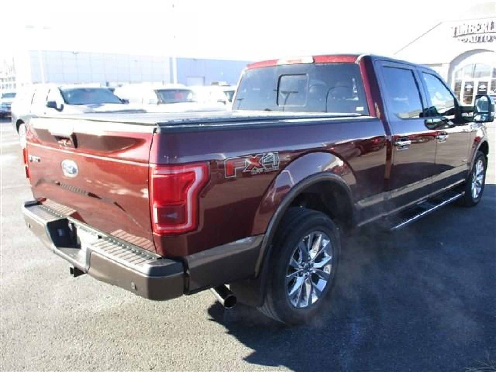 2015 MAROON FORD F150 SUPERCREW (1FTFW1EG4FF) with an 6 engine, Automatic transmission, located at 1580 E Lincoln Rd, Idaho Falls, ID, 83401, (208) 523-4000, 0.000000, 0.000000 - REALLY RARE TWO TONE PAINT ON THIS FX4 F150 ECOBOOST! WE'VE GOT BRAND NEW KHUMO VENTURE AT3 TIRES ON THE WAY FOR IT. ITS GOT A SPRAY IN BED LINER AND A SOFT TUXEDO TONNEAU COVER. COMES WITH FORD'S FACTORY RUNNING BOARDS. IT HAS THE SOFT DROP TAILGATE WITH THE STEP INSIDE. HAS FULL SIZED WEATHER TECH - Photo #5