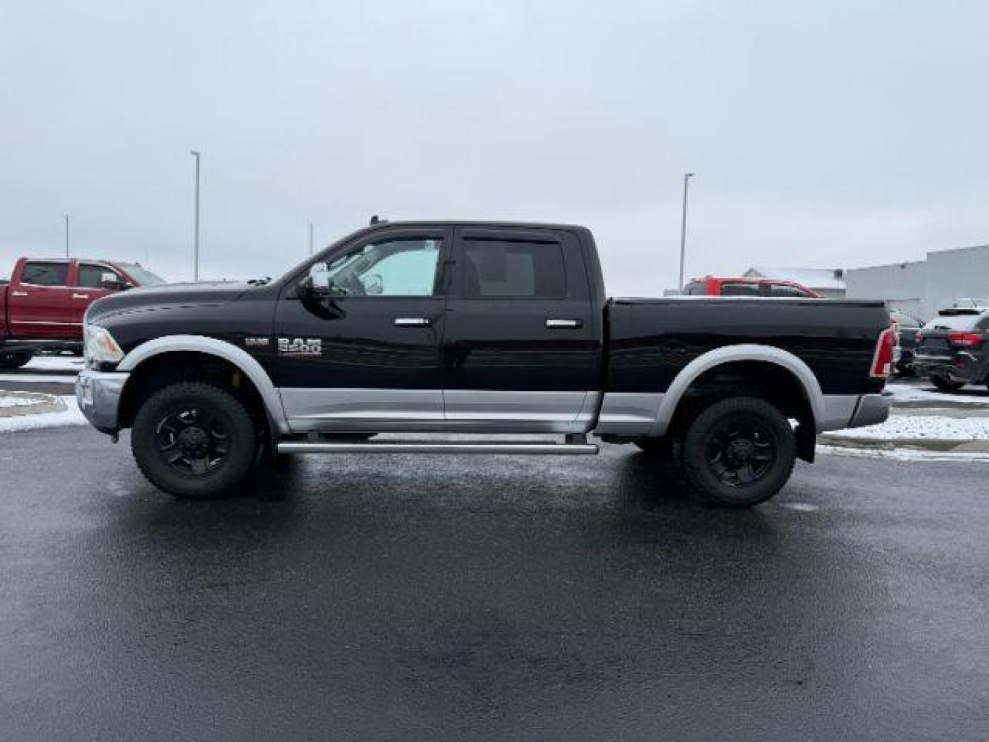 2014 Black Clearcoat /Black Ram 2500 Laramie (3C6UR5FJ2EG) with an HEMI 6.4L V-8 VVT variable valve control engine, AUTOMATIC transmission - At Timberline Auto, finding a great deal on your next vehicle is always easy! Our experienced sales staff's goal is to help find you the right vehicle at the right price! Our knowledgeable finance department has options for almost any credit score. We offer extended service contract options to prote - Photo#1