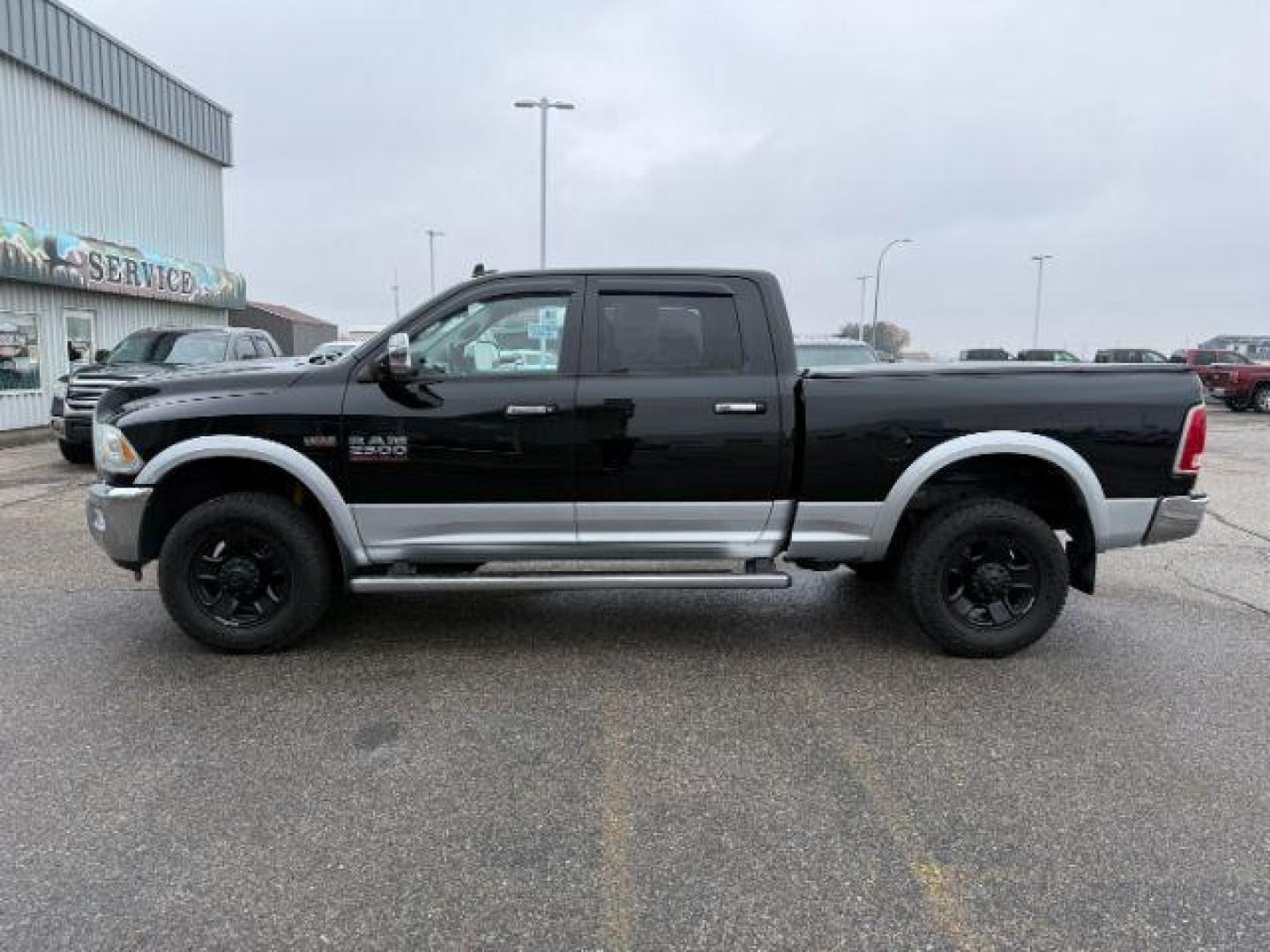 2014 Black Clearcoat /Black Ram 2500 (3C6UR5FJ2EG) with an HEMI 64L V-8 VVT variable valve control engine, Automatic transmission, located at 1175 N Woodruff Ave, Idaho Falls, ID, 83401, 43.506901, -111.999657 - At Timberline Auto, finding a great deal on your next vehicle is always easy! Our experienced sales staff's goal is to help find you the right vehicle at the right price! Our knowledgeable finance department has options for almost any credit score. We offer extended service contract options to prote - Photo#26