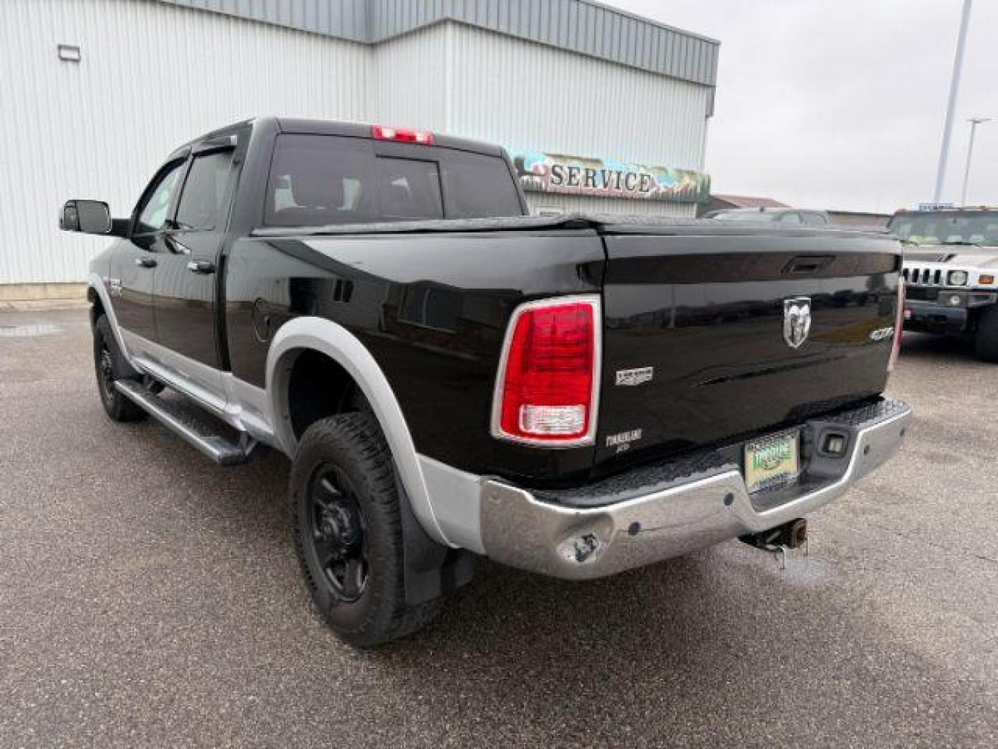 2014 Black Clearcoat /Black Ram 2500 (3C6UR5FJ2EG) with an HEMI 64L V-8 VVT variable valve control engine, Automatic transmission, located at 1175 N Woodruff Ave, Idaho Falls, ID, 83401, 43.506901, -111.999657 - At Timberline Auto, finding a great deal on your next vehicle is always easy! Our experienced sales staff's goal is to help find you the right vehicle at the right price! Our knowledgeable finance department has options for almost any credit score. We offer extended service contract options to prote - Photo#27