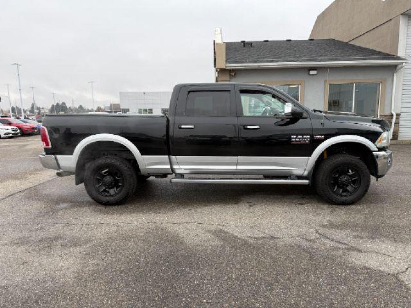 2014 Black Clearcoat /Black Ram 2500 (3C6UR5FJ2EG) with an HEMI 64L V-8 VVT variable valve control engine, Automatic transmission, located at 1175 N Woodruff Ave, Idaho Falls, ID, 83401, 43.506901, -111.999657 - At Timberline Auto, finding a great deal on your next vehicle is always easy! Our experienced sales staff's goal is to help find you the right vehicle at the right price! Our knowledgeable finance department has options for almost any credit score. We offer extended service contract options to prote - Photo#32