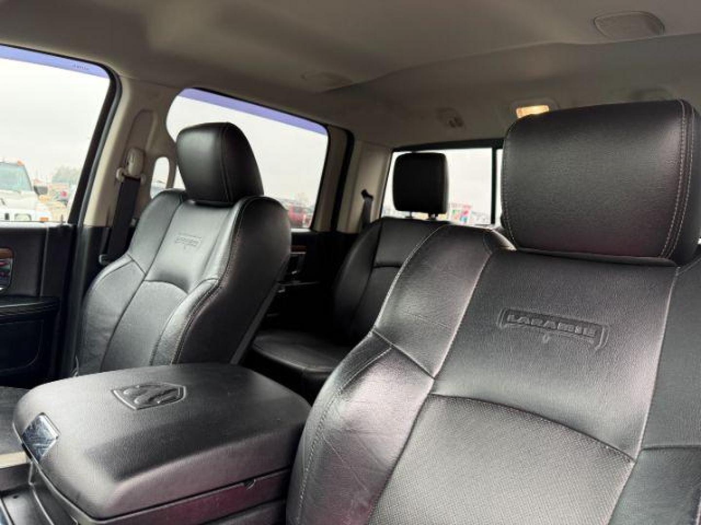 2014 Black Clearcoat /Black Ram 2500 (3C6UR5FJ2EG) with an HEMI 64L V-8 VVT variable valve control engine, Automatic transmission, located at 1175 N Woodruff Ave, Idaho Falls, ID, 83401, 43.506901, -111.999657 - At Timberline Auto, finding a great deal on your next vehicle is always easy! Our experienced sales staff's goal is to help find you the right vehicle at the right price! Our knowledgeable finance department has options for almost any credit score. We offer extended service contract options to prote - Photo#44