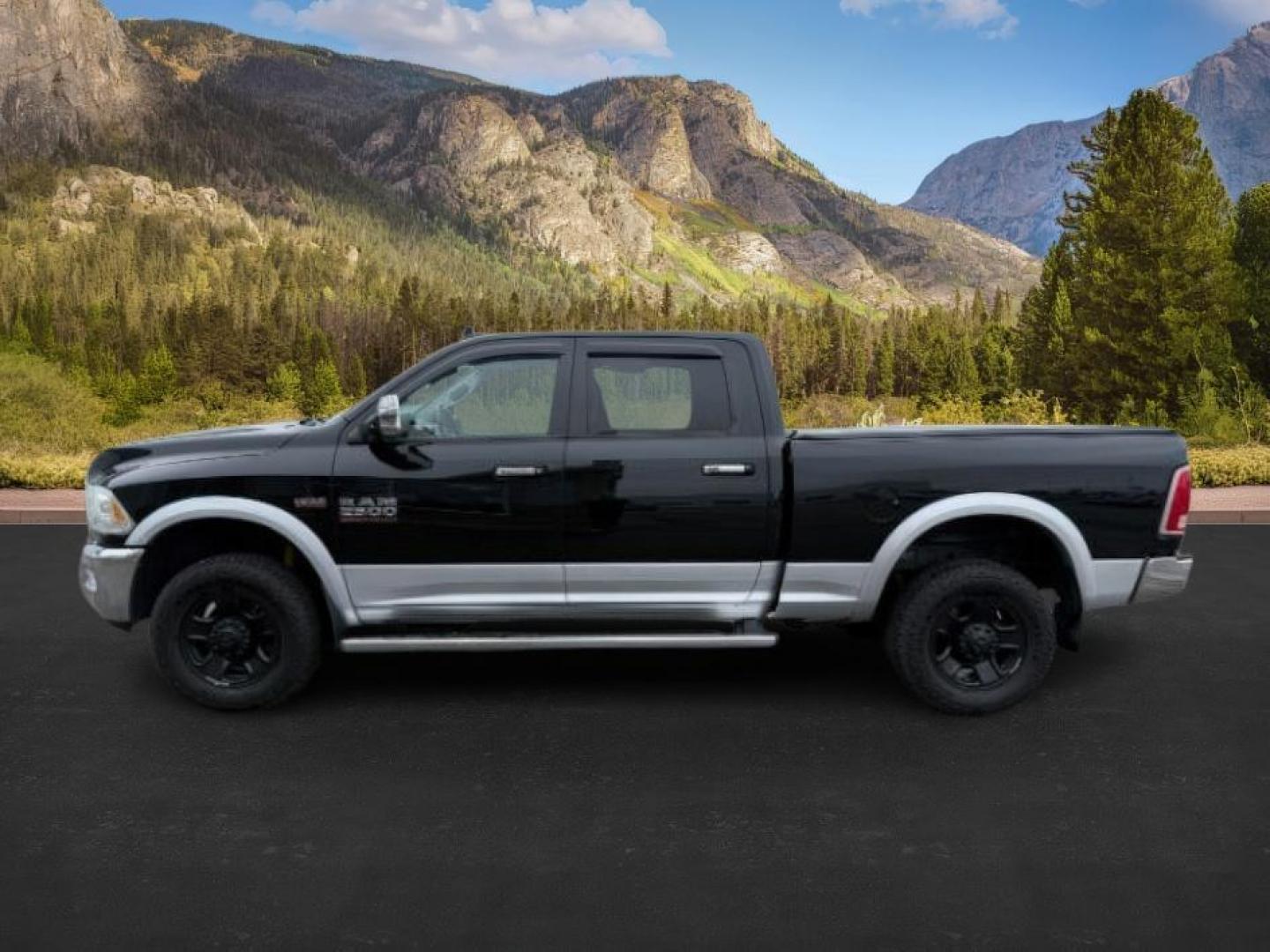 2014 Black Clearcoat /Black Ram 2500 (3C6UR5FJ2EG) with an HEMI 64L V-8 VVT variable valve control engine, Automatic transmission, located at 1175 N Woodruff Ave, Idaho Falls, ID, 83401, 43.506901, -111.999657 - At Timberline Auto, finding a great deal on your next vehicle is always easy! Our experienced sales staff's goal is to help find you the right vehicle at the right price! Our knowledgeable finance department has options for almost any credit score. We offer extended service contract options to prote - Photo#1