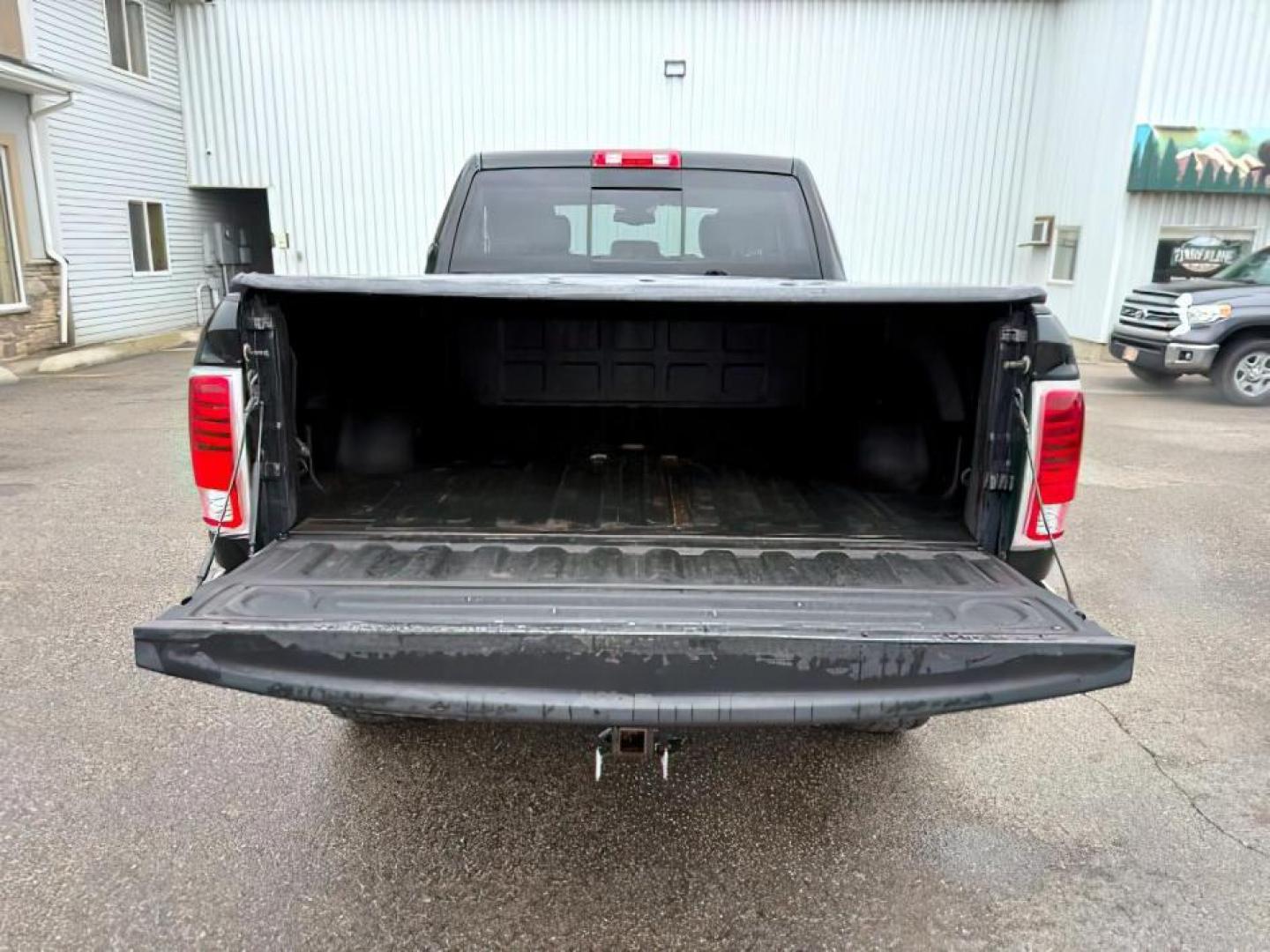 2014 Black Clearcoat /Black Ram 2500 (3C6UR5FJ2EG) with an HEMI 64L V-8 VVT variable valve control engine, Automatic transmission, located at 1175 N Woodruff Ave, Idaho Falls, ID, 83401, 43.506901, -111.999657 - At Timberline Auto, finding a great deal on your next vehicle is always easy! Our experienced sales staff's goal is to help find you the right vehicle at the right price! Our knowledgeable finance department has options for almost any credit score. We offer extended service contract options to prote - Photo#5