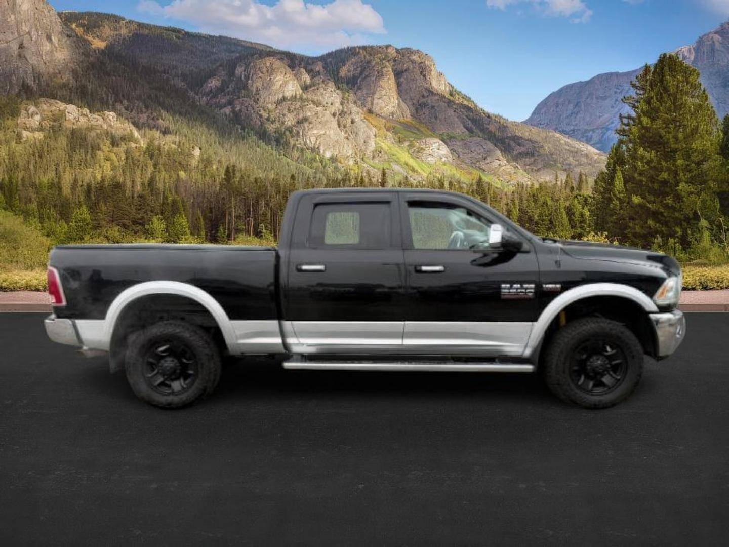 2014 Black Clearcoat /Black Ram 2500 (3C6UR5FJ2EG) with an HEMI 64L V-8 VVT variable valve control engine, Automatic transmission, located at 1175 N Woodruff Ave, Idaho Falls, ID, 83401, 43.506901, -111.999657 - At Timberline Auto, finding a great deal on your next vehicle is always easy! Our experienced sales staff's goal is to help find you the right vehicle at the right price! Our knowledgeable finance department has options for almost any credit score. We offer extended service contract options to prote - Photo#7