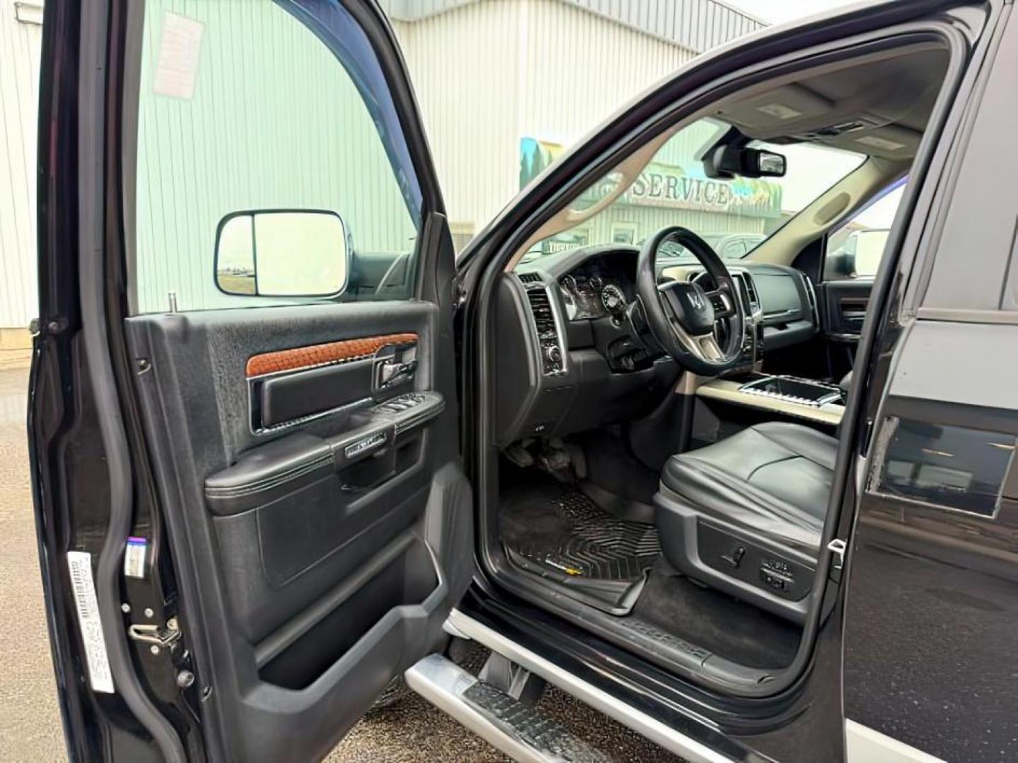 2014 Black Clearcoat /Black Ram 2500 (3C6UR5FJ2EG) with an HEMI 64L V-8 VVT variable valve control engine, Automatic transmission, located at 1175 N Woodruff Ave, Idaho Falls, ID, 83401, 43.506901, -111.999657 - At Timberline Auto, finding a great deal on your next vehicle is always easy! Our experienced sales staff's goal is to help find you the right vehicle at the right price! Our knowledgeable finance department has options for almost any credit score. We offer extended service contract options to prote - Photo#11