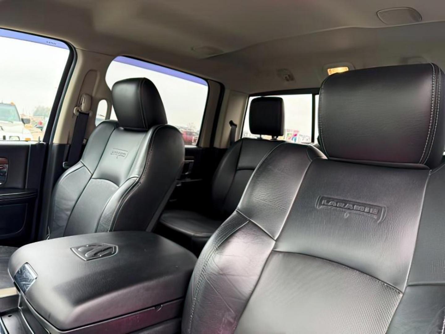 2014 Black Clearcoat /Black Ram 2500 (3C6UR5FJ2EG) with an HEMI 64L V-8 VVT variable valve control engine, Automatic transmission, located at 1175 N Woodruff Ave, Idaho Falls, ID, 83401, 43.506901, -111.999657 - At Timberline Auto, finding a great deal on your next vehicle is always easy! Our experienced sales staff's goal is to help find you the right vehicle at the right price! Our knowledgeable finance department has options for almost any credit score. We offer extended service contract options to prote - Photo#19