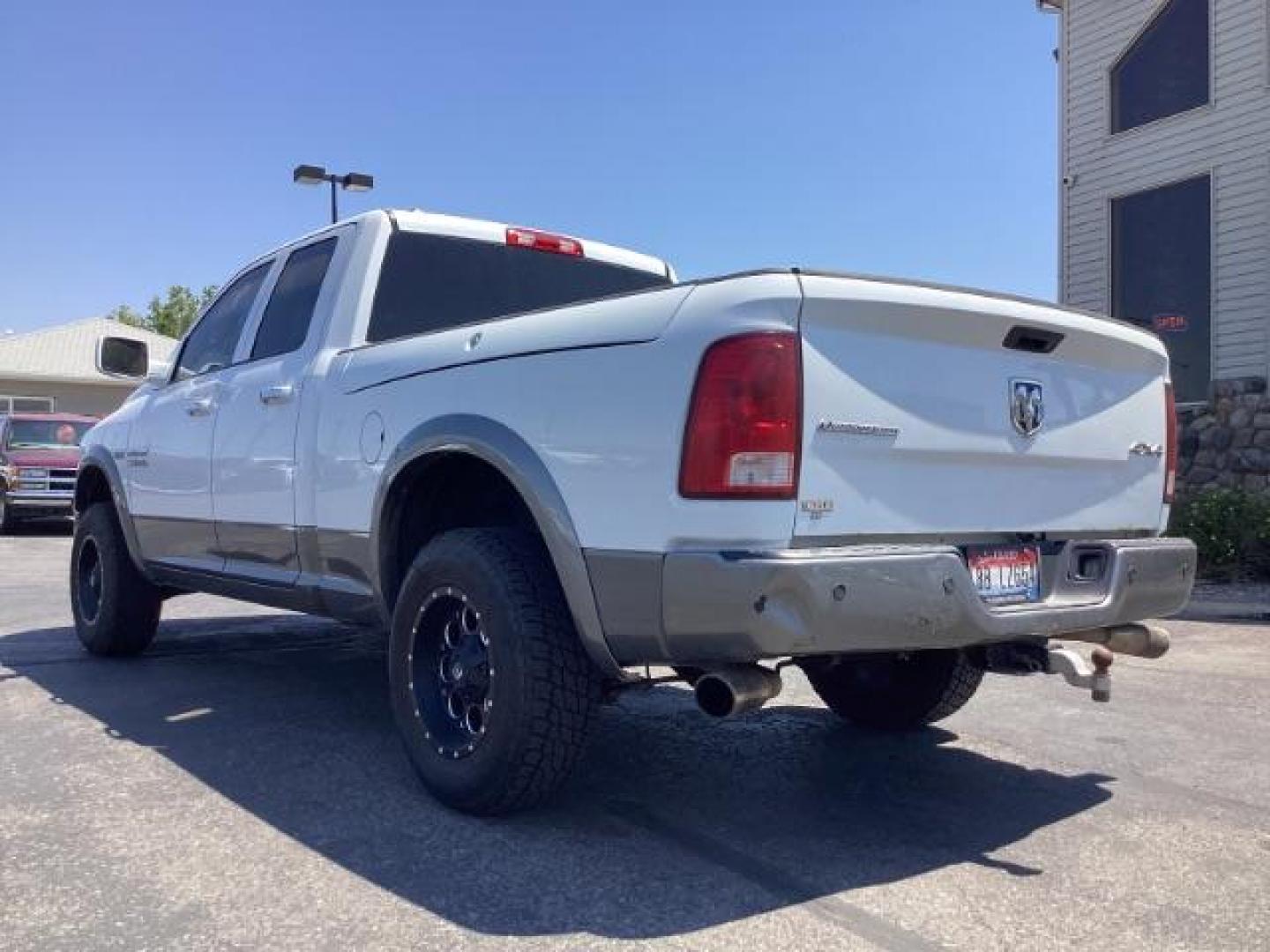 2013 WHITE RAM 1500 SLT Quad Cab 4WD (1C6RR7GTXDS) with an 5.7L V8 OHV 16V engine, 6-Speed Automatic transmission, located at 1235 N Woodruff Ave., Idaho Falls, 83401, (208) 523-1053, 43.507172, -112.000488 - Photo#3