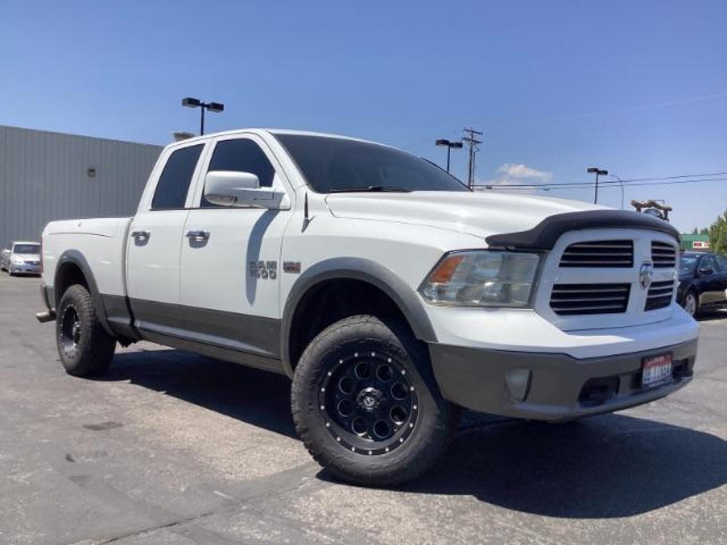 2013 WHITE RAM 1500 SLT Quad Cab 4WD (1C6RR7GTXDS) with an 5.7L V8 OHV 16V engine, 6-Speed Automatic transmission, located at 1235 N Woodruff Ave., Idaho Falls, 83401, (208) 523-1053, 43.507172, -112.000488 - Photo#7