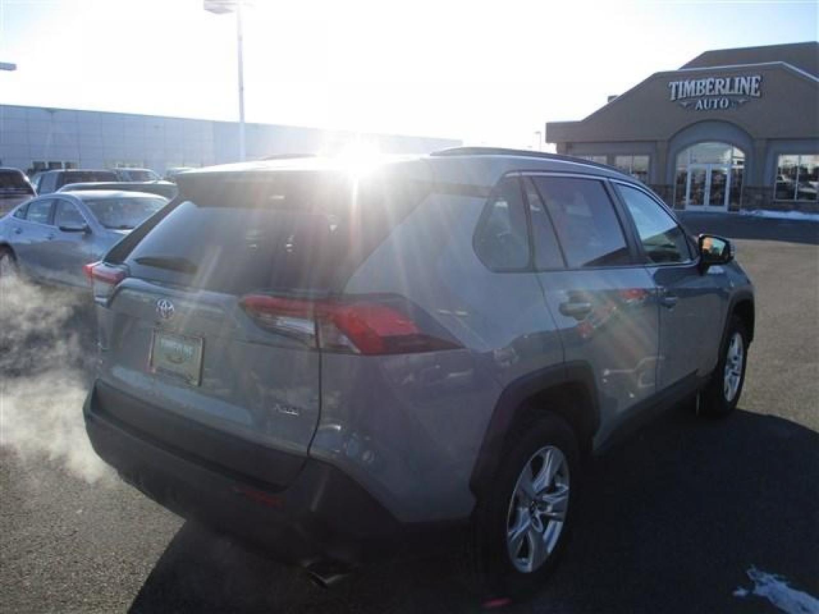 2021 GREY /LUNAR ROCK /GREY TOYOTA RAV4 XLE (2T3W1RFV6MW) with an 4 engine, Automatic transmission, located at 1235 N Woodruff Ave., Idaho Falls, 83401, (208) 523-1053, 43.507172, -112.000488 - This Lunar Rock grey 2021 Toyota Rav4 XLE looks as new as it is! Toyota claims their Rav4's can reach upwards of 28 MPG in the city and 35 MPG on the highway! This specific model comes with blind spot monitors, lane assist, adaptive cruise control, back up camera, bluetooth connectivity, and so much - Photo #5