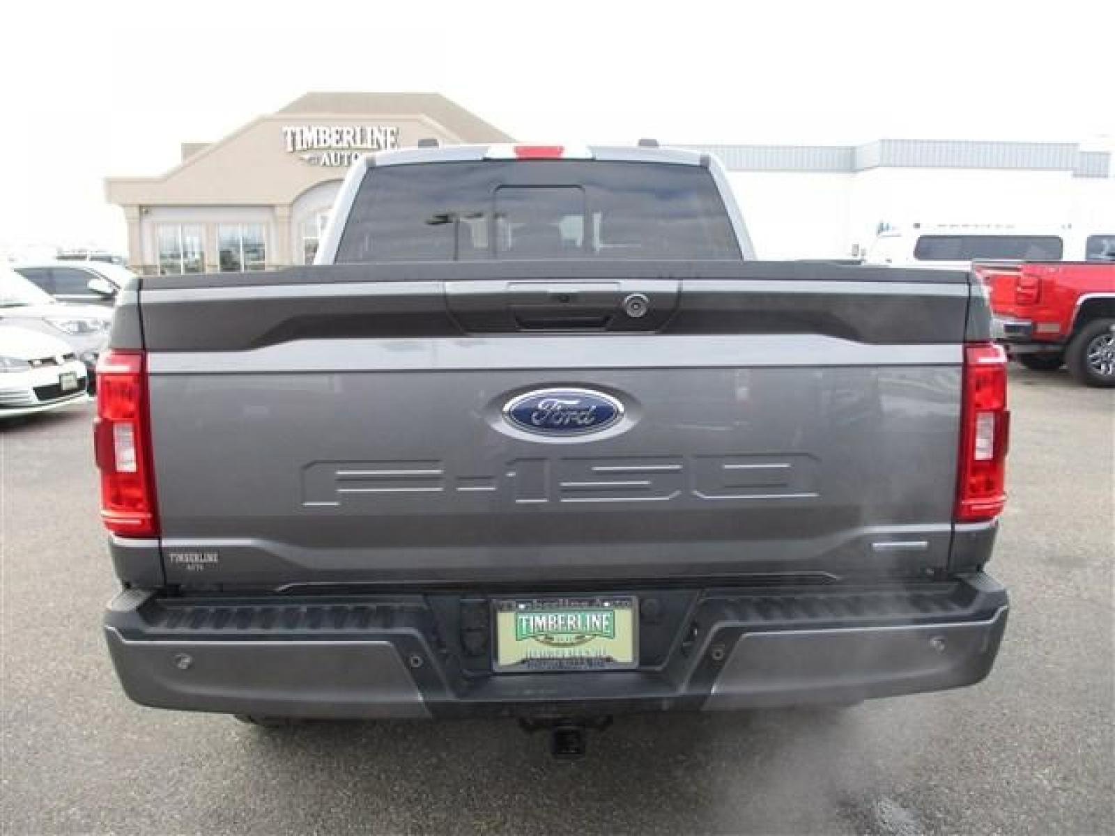 2022 GRAY /BLACK FORD F150 SPORT (1FTFW1E86NK) with an 6 engine, located at 1235 N Woodruff Ave., Idaho Falls, 83401, (208) 523-1053, 43.507172, -112.000488 - Still has the new car smell! They don't make XLT's like they used to. This near base model halfton pickup is comparable to older model upper packages. Outside you see the factory sport wheels, wide running boards, and color matched bumpers. Inside you see an inviting cloth grey interior with dual po - Photo #4