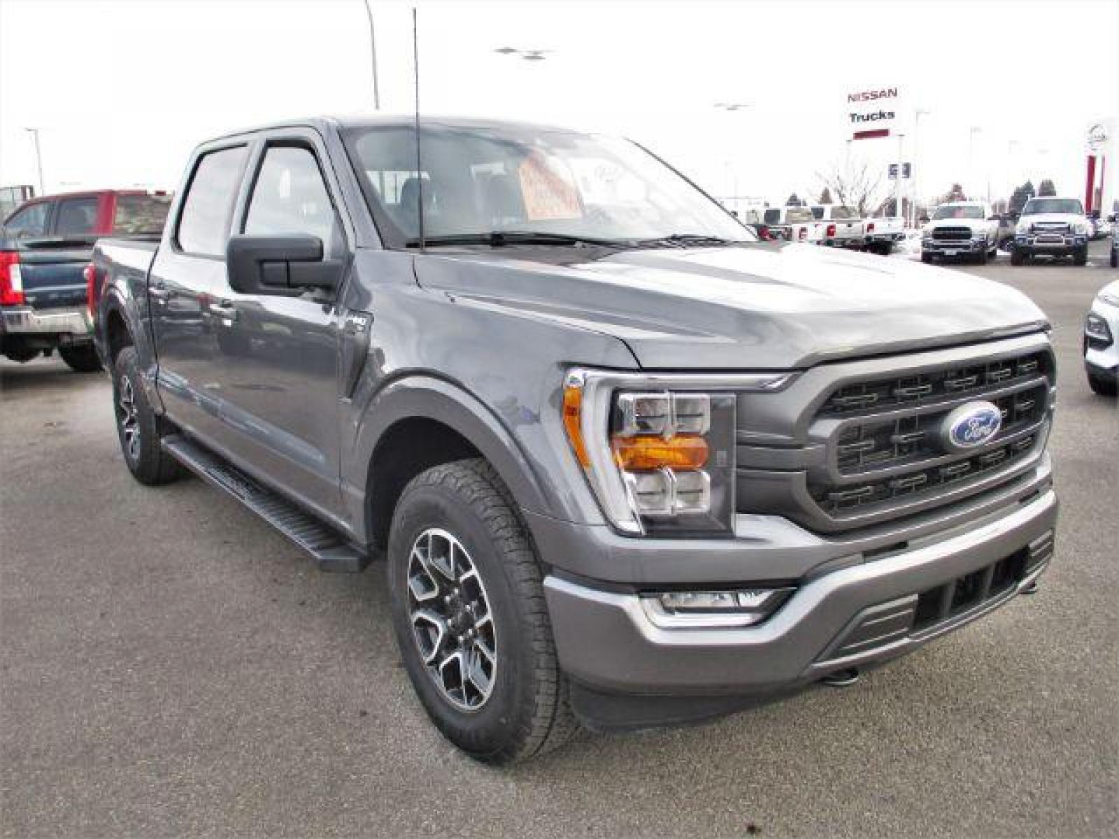 2022 Carbonized Gray Metallic /Black/Medium Dark Slate Ford F-150 Sport SuperCrew 5.5-ft. Bed 4WD (1FTFW1E86NK) with an 3.5L V6 DOHC 24V engine, 10-Speed Automatic transmission, located at 1235 N Woodruff Ave., Idaho Falls, 83401, (208) 523-1053, 43.507172, -112.000488 - Outside you see the factory sport wheels, wide running boards, and color matched bumpers. Inside you see an inviting cloth grey interior with dual power seats, heated seats, a large 12 inch touchscreen display offering a high definition back up camera, blind spot monitors, lane assist, remote start, - Photo #7