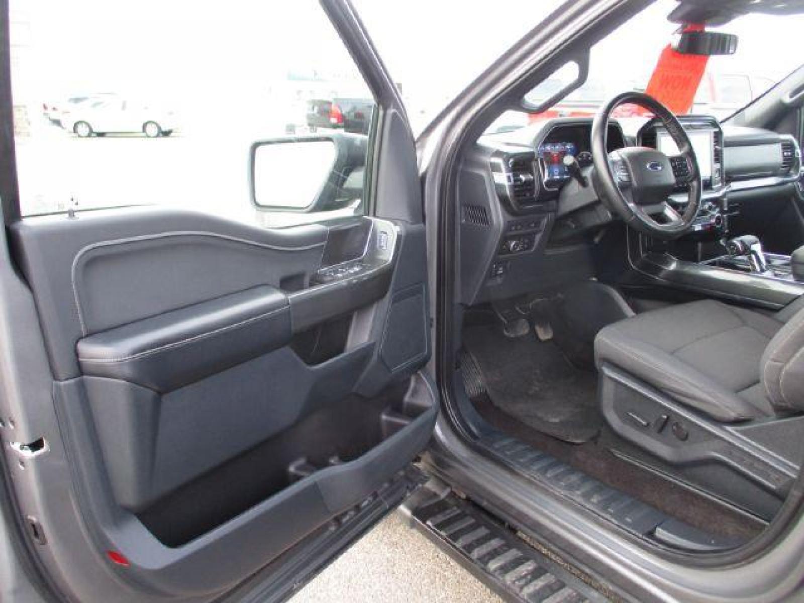 2022 Carbonized Gray Metallic /Black/Medium Dark Slate Ford F-150 Sport SuperCrew 5.5-ft. Bed 4WD (1FTFW1E86NK) with an 3.5L V6 DOHC 24V engine, 10-Speed Automatic transmission, located at 1235 N Woodruff Ave., Idaho Falls, 83401, (208) 523-1053, 43.507172, -112.000488 - Outside you see the factory sport wheels, wide running boards, and color matched bumpers. Inside you see an inviting cloth grey interior with dual power seats, heated seats, a large 12 inch touchscreen display offering a high definition back up camera, blind spot monitors, lane assist, remote start, - Photo #9