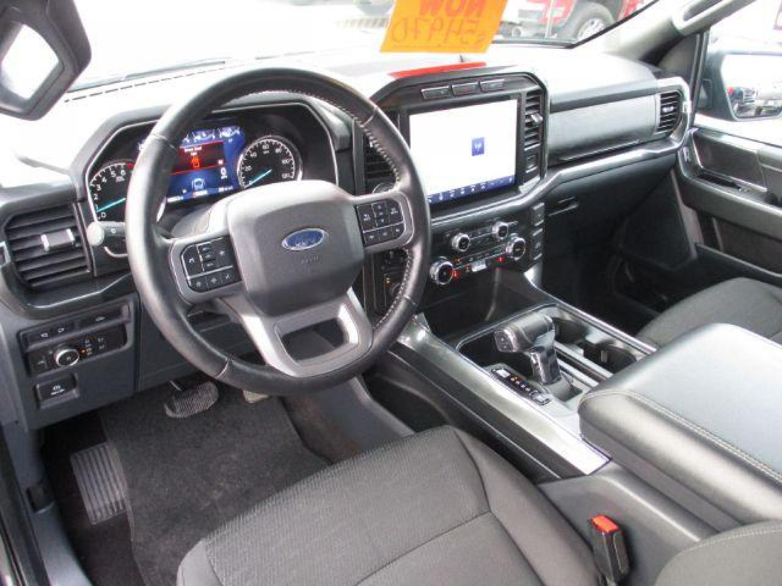 2022 Carbonized Gray Metallic /Black/Medium Dark Slate Ford F-150 Sport SuperCrew 5.5-ft. Bed 4WD (1FTFW1E86NK) with an 3.5L V6 DOHC 24V engine, 10-Speed Automatic transmission, located at 1235 N Woodruff Ave., Idaho Falls, 83401, (208) 523-1053, 43.507172, -112.000488 - Outside you see the factory sport wheels, wide running boards, and color matched bumpers. Inside you see an inviting cloth grey interior with dual power seats, heated seats, a large 12 inch touchscreen display offering a high definition back up camera, blind spot monitors, lane assist, remote start, - Photo #11