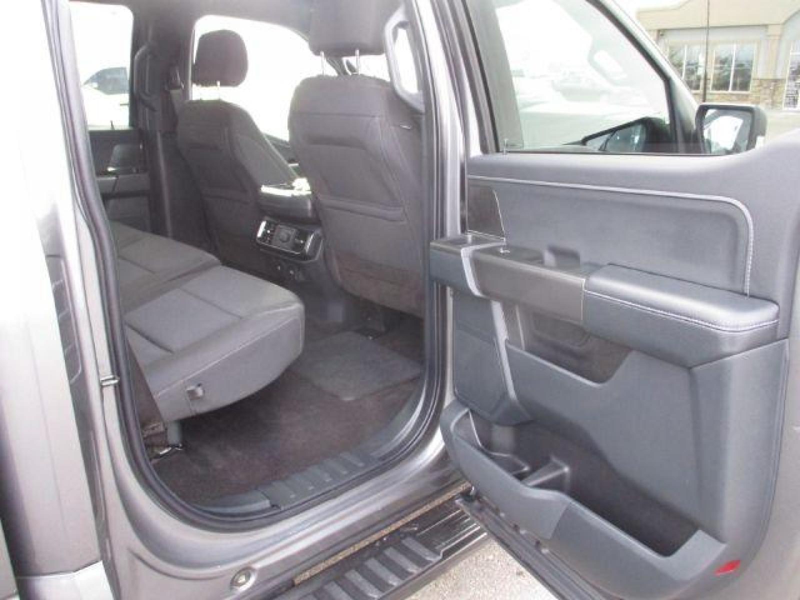 2022 Carbonized Gray Metallic /Black/Medium Dark Slate Ford F-150 Sport SuperCrew 5.5-ft. Bed 4WD (1FTFW1E86NK) with an 3.5L V6 DOHC 24V engine, 10-Speed Automatic transmission, located at 1235 N Woodruff Ave., Idaho Falls, 83401, (208) 523-1053, 43.507172, -112.000488 - Outside you see the factory sport wheels, wide running boards, and color matched bumpers. Inside you see an inviting cloth grey interior with dual power seats, heated seats, a large 12 inch touchscreen display offering a high definition back up camera, blind spot monitors, lane assist, remote start, - Photo #16