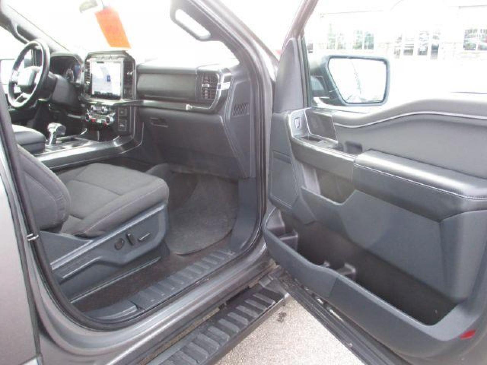 2022 Carbonized Gray Metallic /Black/Medium Dark Slate Ford F-150 Sport SuperCrew 5.5-ft. Bed 4WD (1FTFW1E86NK) with an 3.5L V6 DOHC 24V engine, 10-Speed Automatic transmission, located at 1235 N Woodruff Ave., Idaho Falls, 83401, (208) 523-1053, 43.507172, -112.000488 - Outside you see the factory sport wheels, wide running boards, and color matched bumpers. Inside you see an inviting cloth grey interior with dual power seats, heated seats, a large 12 inch touchscreen display offering a high definition back up camera, blind spot monitors, lane assist, remote start, - Photo #20