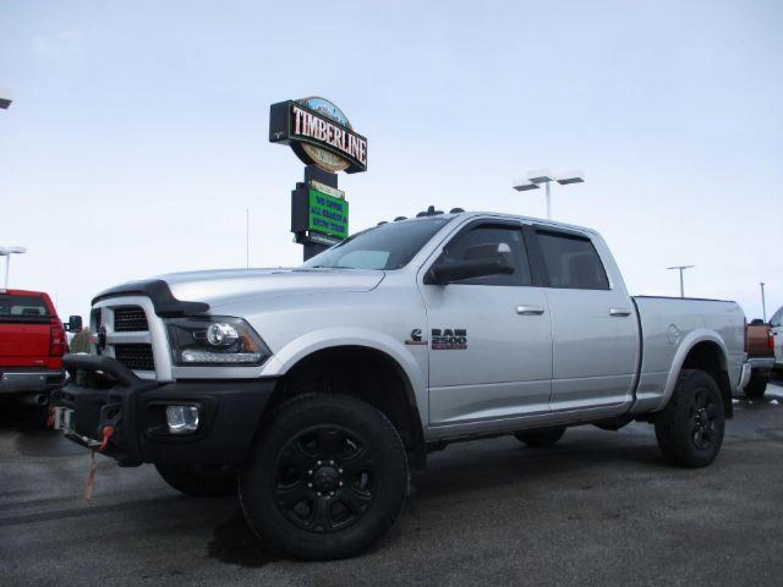 2017 Maximum Steel Metallic Clear Coat/Bright Silver Me /Black, leather RAM 2500 Laramie Crew Cab SWB 4WD (3C6UR5FL4HG) with an 6.7L L6 OHV 24V TURBO DIESEL engine, 6-Speed Automatic transmission, located at 1235 N Woodruff Ave., Idaho Falls, 83401, (208) 523-1053, 43.507172, -112.000488 - Here we have a 2017 RAM 2500 LARAMIE with the 6.7L straight six turbo diesel engine. The truck rides on coil springs in the front and in the rear offering a smoother ride than its older counterparts. With that suspension you'll notice a tighter turning radius and a wide range of drivability differen - Photo #0