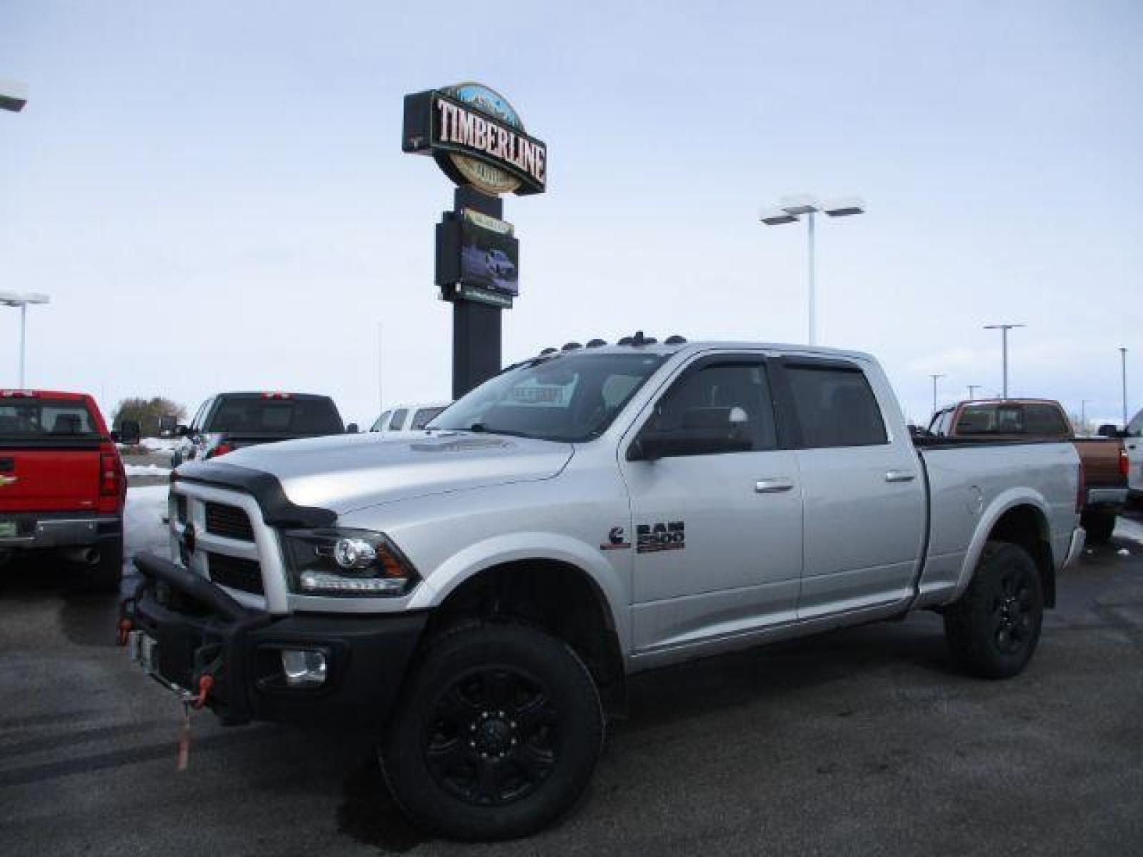 2017 Maximum Steel Metallic Clear Coat/Bright Silver Me /Black, leather RAM 2500 Laramie Crew Cab SWB 4WD (3C6UR5FL4HG) with an 6.7L L6 OHV 24V TURBO DIESEL engine, 6-Speed Automatic transmission, located at 1235 N Woodruff Ave., Idaho Falls, 83401, (208) 523-1053, 43.507172, -112.000488 - Here we have a 2017 RAM 2500 LARAMIE with the 6.7L straight six turbo diesel engine. The truck rides on coil springs in the front and in the rear offering a smoother ride than its older counterparts. With that suspension you'll notice a tighter turning radius and a wide range of drivability differen - Photo #1