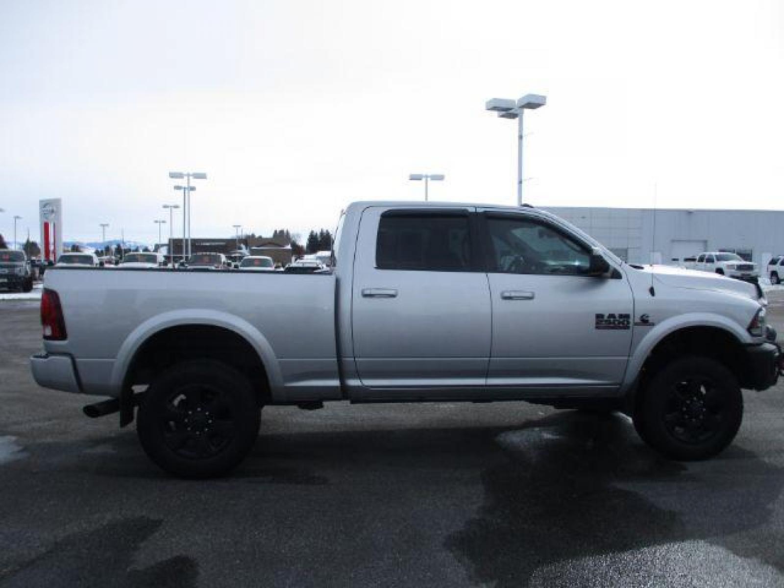 2017 Maximum Steel Metallic Clear Coat/Bright Silver Me /Black, leather RAM 2500 Laramie Crew Cab SWB 4WD (3C6UR5FL4HG) with an 6.7L L6 OHV 24V TURBO DIESEL engine, 6-Speed Automatic transmission, located at 1235 N Woodruff Ave., Idaho Falls, 83401, (208) 523-1053, 43.507172, -112.000488 - Here we have a 2017 RAM 2500 LARAMIE with the 6.7L straight six turbo diesel engine. The truck rides on coil springs in the front and in the rear offering a smoother ride than its older counterparts. With that suspension you'll notice a tighter turning radius and a wide range of drivability differen - Photo #6