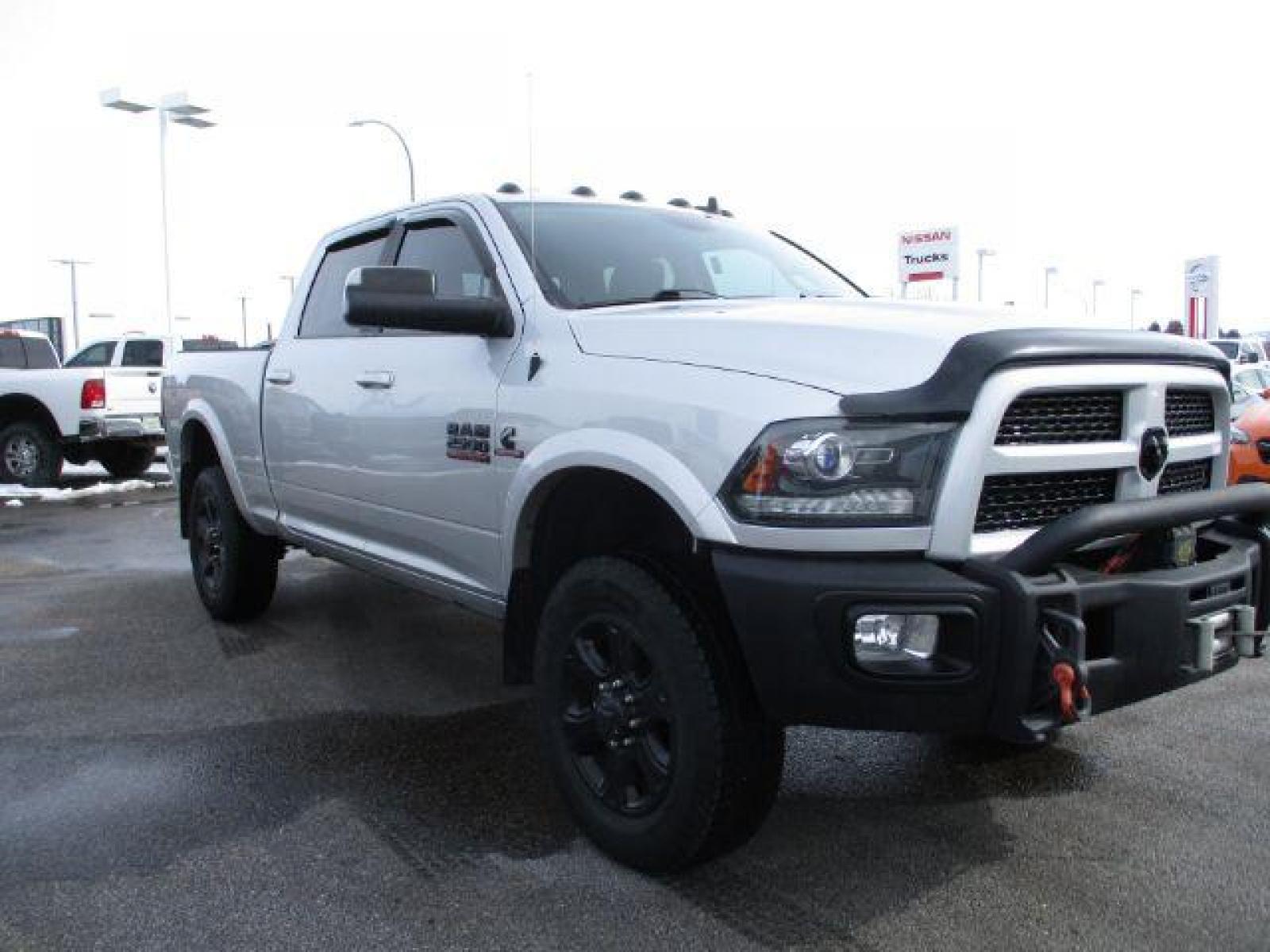 2017 Maximum Steel Metallic Clear Coat/Bright Silver Me /Black, leather RAM 2500 Laramie Crew Cab SWB 4WD (3C6UR5FL4HG) with an 6.7L L6 OHV 24V TURBO DIESEL engine, 6-Speed Automatic transmission, located at 1235 N Woodruff Ave., Idaho Falls, 83401, (208) 523-1053, 43.507172, -112.000488 - Here we have a 2017 RAM 2500 LARAMIE with the 6.7L straight six turbo diesel engine. The truck rides on coil springs in the front and in the rear offering a smoother ride than its older counterparts. With that suspension you'll notice a tighter turning radius and a wide range of drivability differen - Photo #7