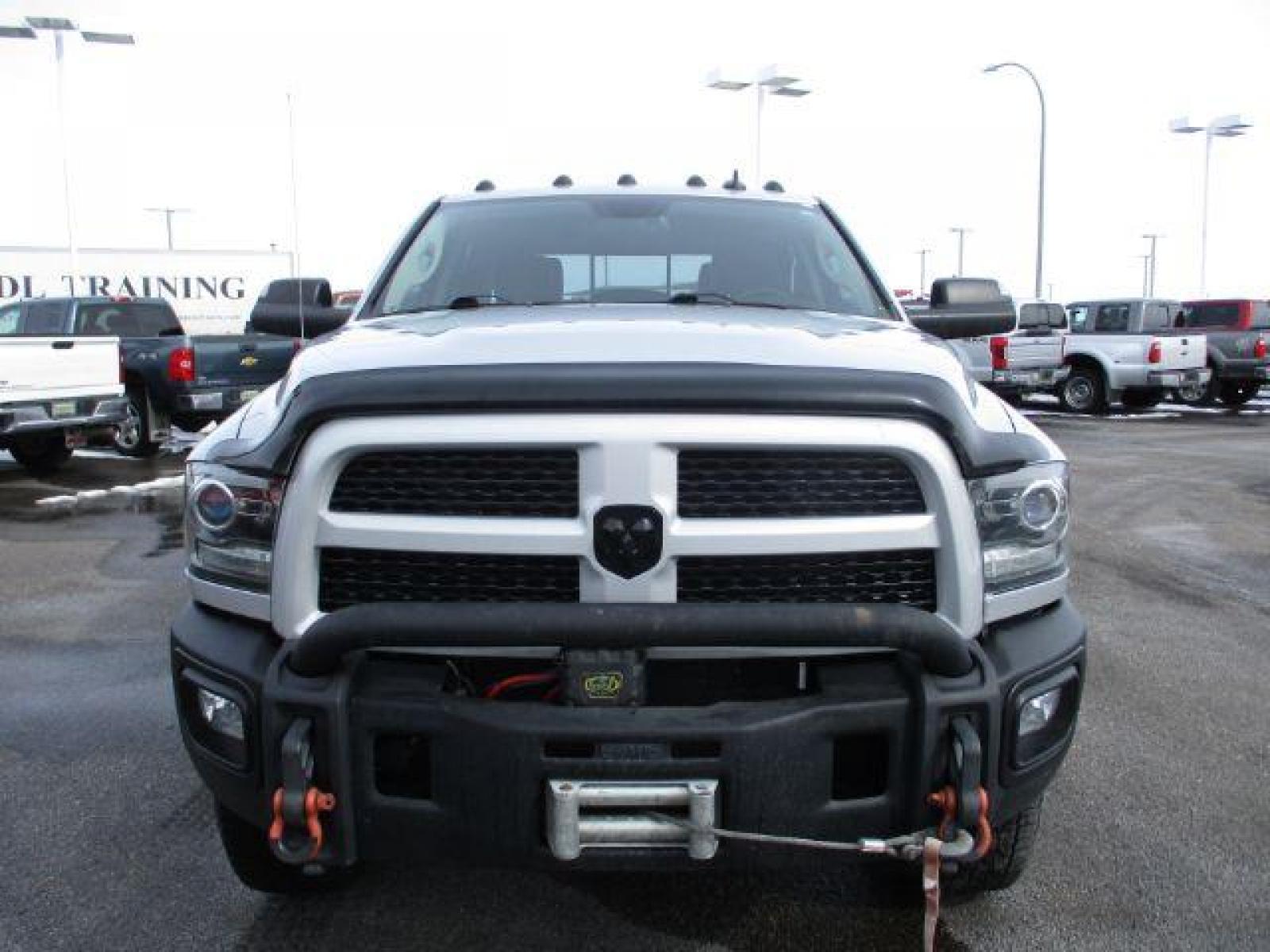 2017 Maximum Steel Metallic Clear Coat/Bright Silver Me /Black, leather RAM 2500 Laramie Crew Cab SWB 4WD (3C6UR5FL4HG) with an 6.7L L6 OHV 24V TURBO DIESEL engine, 6-Speed Automatic transmission, located at 1235 N Woodruff Ave., Idaho Falls, 83401, (208) 523-1053, 43.507172, -112.000488 - Here we have a 2017 RAM 2500 LARAMIE with the 6.7L straight six turbo diesel engine. The truck rides on coil springs in the front and in the rear offering a smoother ride than its older counterparts. With that suspension you'll notice a tighter turning radius and a wide range of drivability differen - Photo #8