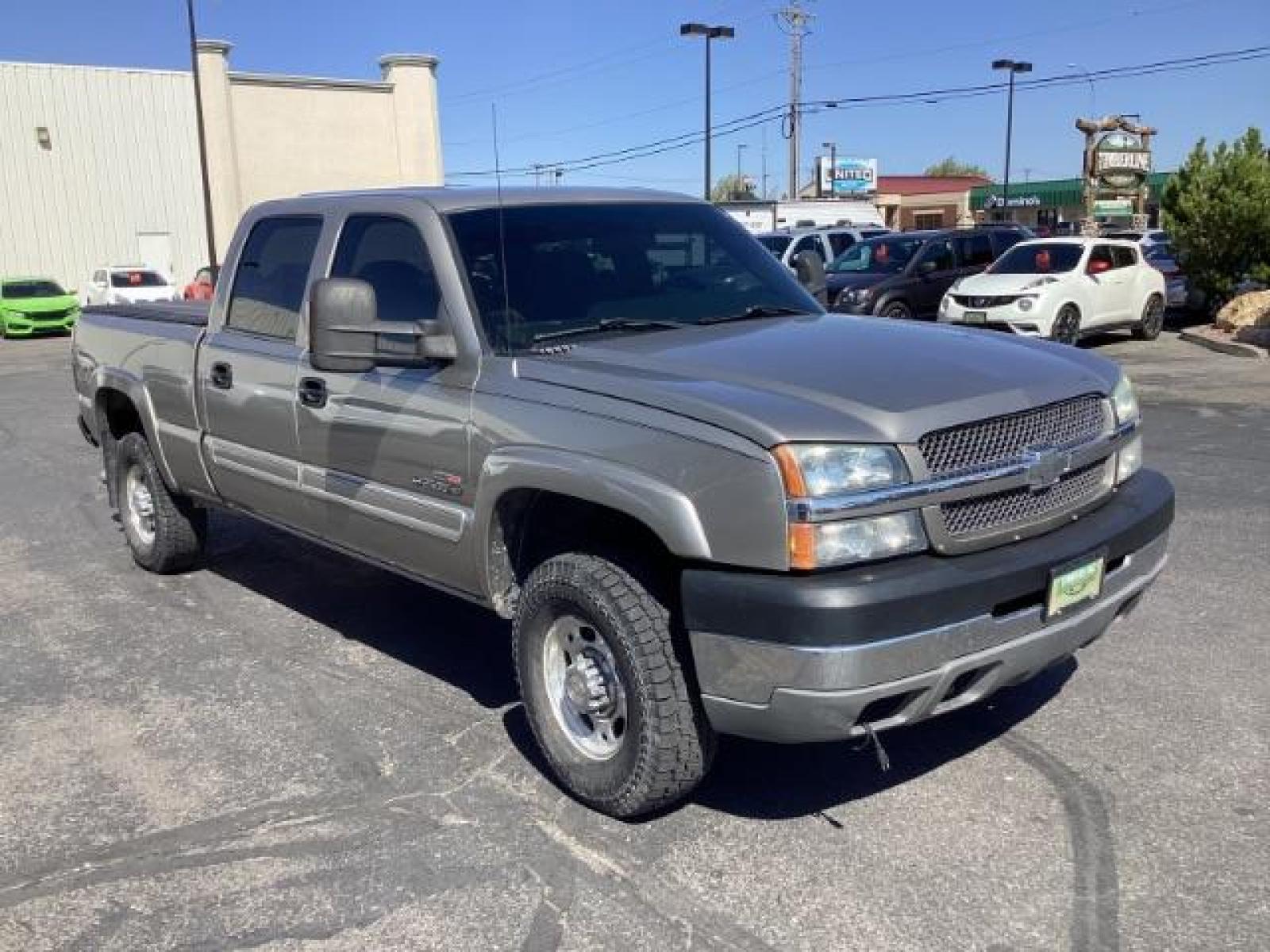 2003 Light Pewter Metallic /Dark Charcoal Cloth Interior Chevrolet Silverado 2500HD LS Crew Cab Short Bed 4WD (1GCHK23183F) with an 6.6L V8 OHV 32V TURBO DIESEL engine, 5-Speed Automatic transmission, located at 1235 N Woodruff Ave., Idaho Falls, 83401, (208) 523-1053, 43.507172, -112.000488 - The 2003 Chevrolet Silverado 2500 Duramax is a robust and capable heavy-duty truck, particularly renowned for its towing and hauling capabilities. Here are some of its key features: Engine: The standout feature of the 2003 Silverado 2500 Duramax is its 6.6-liter Duramax turbocharged diesel V8 engin - Photo #4