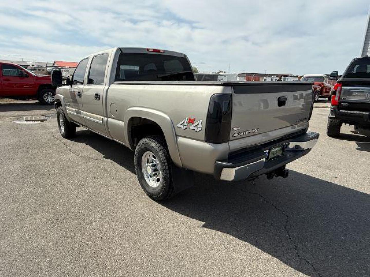 2003 Light Pewter Metallic /Dark Charcoal Cloth Interior Chevrolet Silverado 2500HD LS Crew Cab Short Bed 4WD (1GCHK23183F) with an 6.6L V8 OHV 32V TURBO DIESEL engine, 5-Speed Automatic transmission, located at 1235 N Woodruff Ave., Idaho Falls, 83401, (208) 523-1053, 43.507172, -112.000488 - At Timberline Auto, finding a great deal on your next vehicle is always easy! Our experienced sales staff's goal is to help find you the right vehicle at the right price! Our knowledgeable finance department has options for almost any credit score. We offer extended service contract options to prote - Photo#2