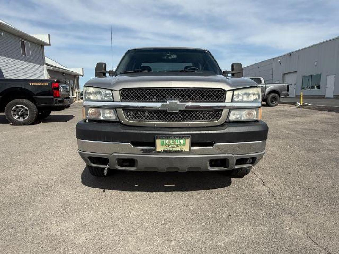 2003 Light Pewter Metallic /Dark Charcoal Cloth Interior Chevrolet Silverado 2500HD LS Crew Cab Short Bed 4WD (1GCHK23183F) with an 6.6L V8 OHV 32V TURBO DIESEL engine, 5-Speed Automatic transmission, located at 1235 N Woodruff Ave., Idaho Falls, 83401, (208) 523-1053, 43.507172, -112.000488 - At Timberline Auto, finding a great deal on your next vehicle is always easy! Our experienced sales staff's goal is to help find you the right vehicle at the right price! Our knowledgeable finance department has options for almost any credit score. We offer extended service contract options to prote - Photo#7