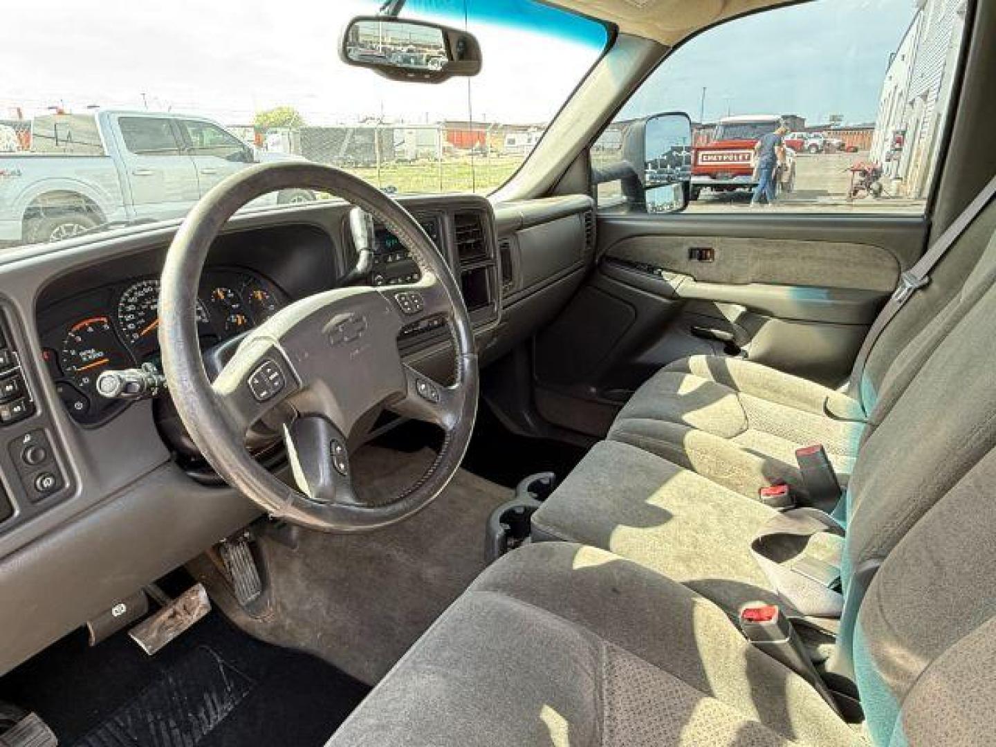 2003 Light Pewter Metallic /Dark Charcoal Cloth Interior Chevrolet Silverado 2500HD LS Crew Cab Short Bed 4WD (1GCHK23183F) with an 6.6L V8 OHV 32V TURBO DIESEL engine, 5-Speed Automatic transmission, located at 1235 N Woodruff Ave., Idaho Falls, 83401, (208) 523-1053, 43.507172, -112.000488 - At Timberline Auto, finding a great deal on your next vehicle is always easy! Our experienced sales staff's goal is to help find you the right vehicle at the right price! Our knowledgeable finance department has options for almost any credit score. We offer extended service contract options to prote - Photo#10