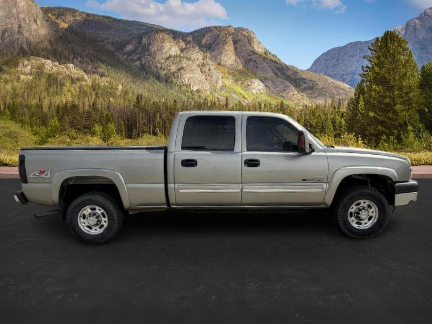2003 Light Pewter Metallic /Dark Charcoal Cloth Interior Chevrolet Silverado 2500HD LS Crew Cab Short Bed 4WD (1GCHK23183F) with an 6.6L V8 OHV 32V TURBO DIESEL engine, 5-Speed Automatic transmission, located at 1235 N Woodruff Ave., Idaho Falls, 83401, (208) 523-1053, 43.507172, -112.000488 - At Timberline Auto, finding a great deal on your next vehicle is always easy! Our experienced sales staff's goal is to help find you the right vehicle at the right price! Our knowledgeable finance department has options for almost any credit score. We offer extended service contract options to prote - Photo#5