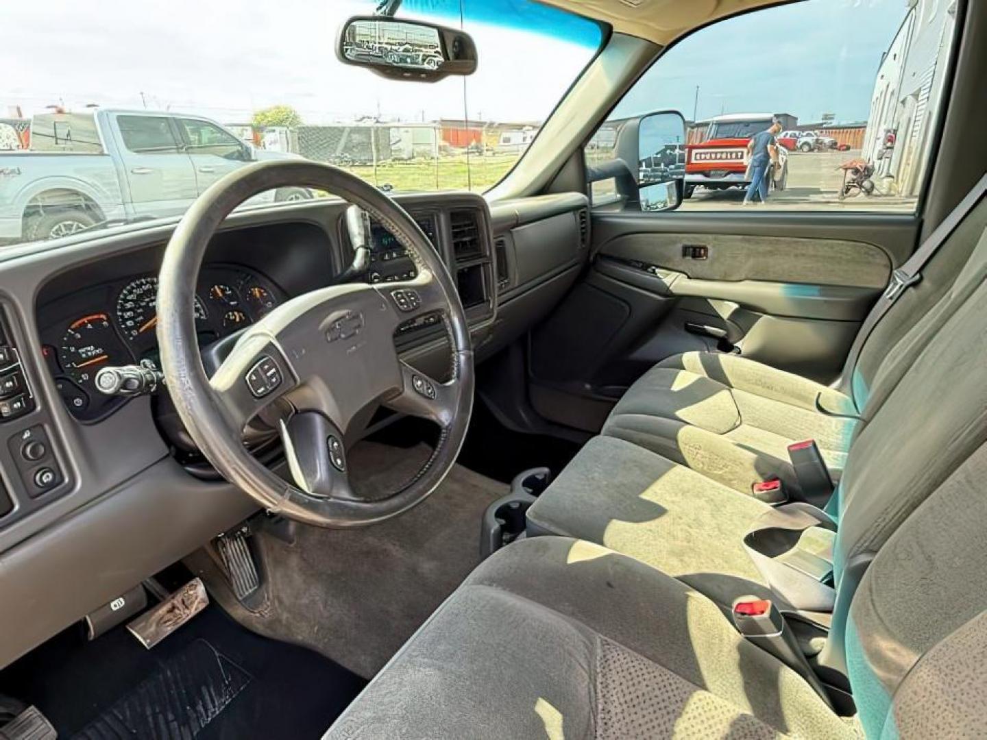 2003 Light Pewter Metallic /Dark Charcoal Cloth Interior Chevrolet Silverado 2500HD LS Crew Cab Short Bed 4WD (1GCHK23183F) with an 6.6L V8 OHV 32V TURBO DIESEL engine, 5-Speed Automatic transmission, located at 1235 N Woodruff Ave., Idaho Falls, 83401, (208) 523-1053, 43.507172, -112.000488 - At Timberline Auto, finding a great deal on your next vehicle is always easy! Our experienced sales staff's goal is to help find you the right vehicle at the right price! Our knowledgeable finance department has options for almost any credit score. We offer extended service contract options to prote - Photo#10