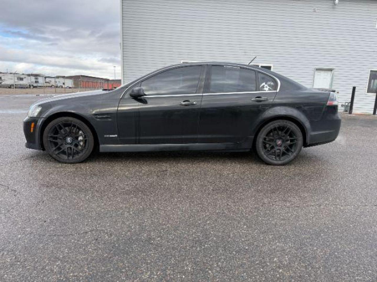 2009 BLACK /Onyx Leather Interior Pontiac G8 (6G2EC57YX9L) with an 60L V8 OHV 16V engine, Automatic transmission, located at 1175 N Woodruff Ave, Idaho Falls, ID, 83401, 43.506901, -111.999657 - At Timberline Auto, finding a great deal on your next vehicle is always easy! Our experienced sales staff's goal is to help find you the right vehicle at the right price! Our knowledgeable finance department has options for almost any credit score. We offer extended service contract options to prote - Photo#1