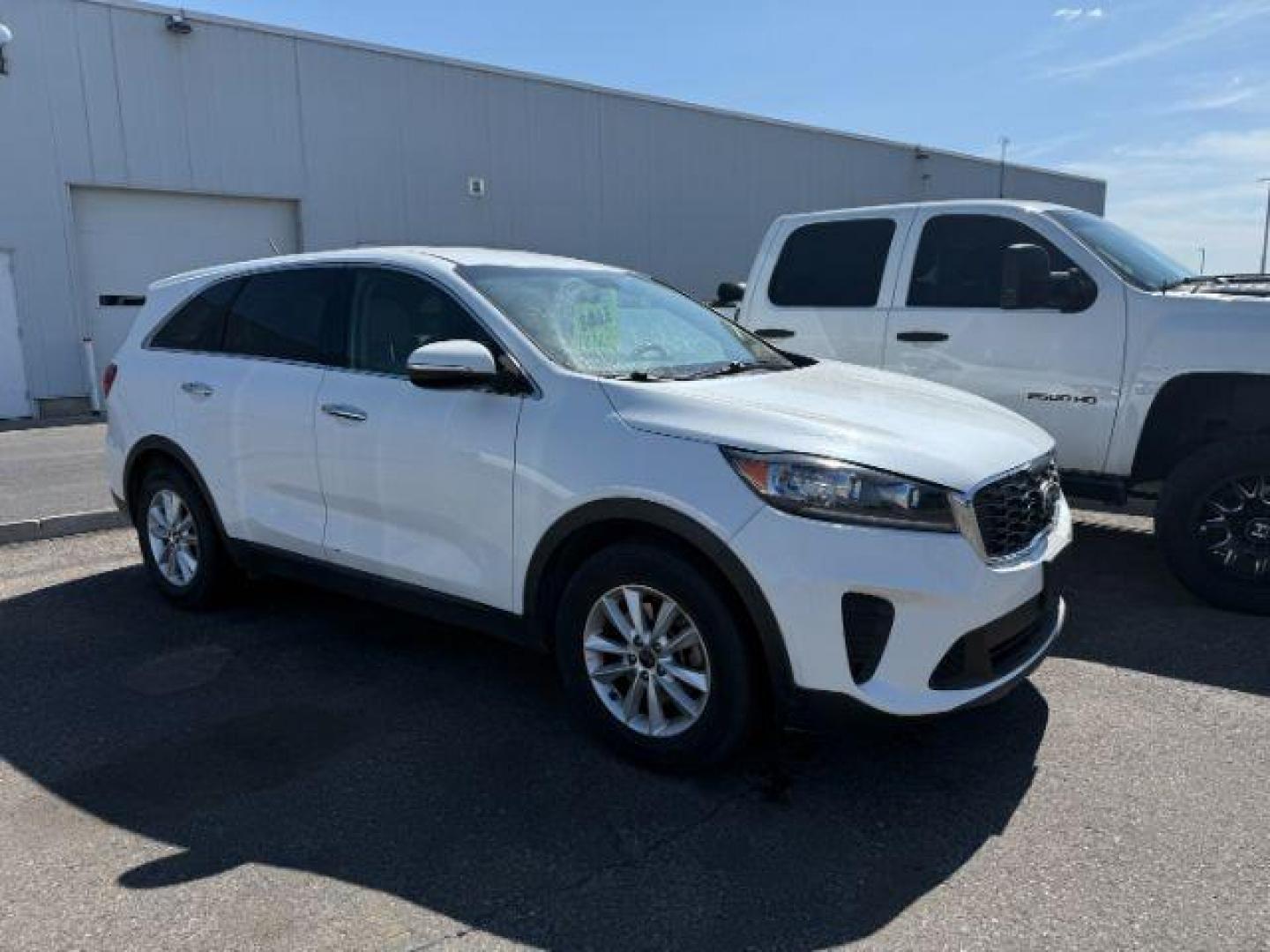 2019 WHITE /Stone Beige Kia Sorento 2.4L LX (5XYPG4A38KG) with an 2.4L I-4 gasoline direct injection engine, AUTOMATIC transmission, located at 1235 N Woodruff Ave., Idaho Falls, 83401, (208) 523-1053, 43.507172, -112.000488 - At Timberline Auto, finding a great deal on your next vehicle is always easy! Our experienced sales staff's goal is to help find you the right vehicle at the right price! Our knowledgeable finance department has options for almost any credit score. We offer extended service contract options to prote - Photo#1