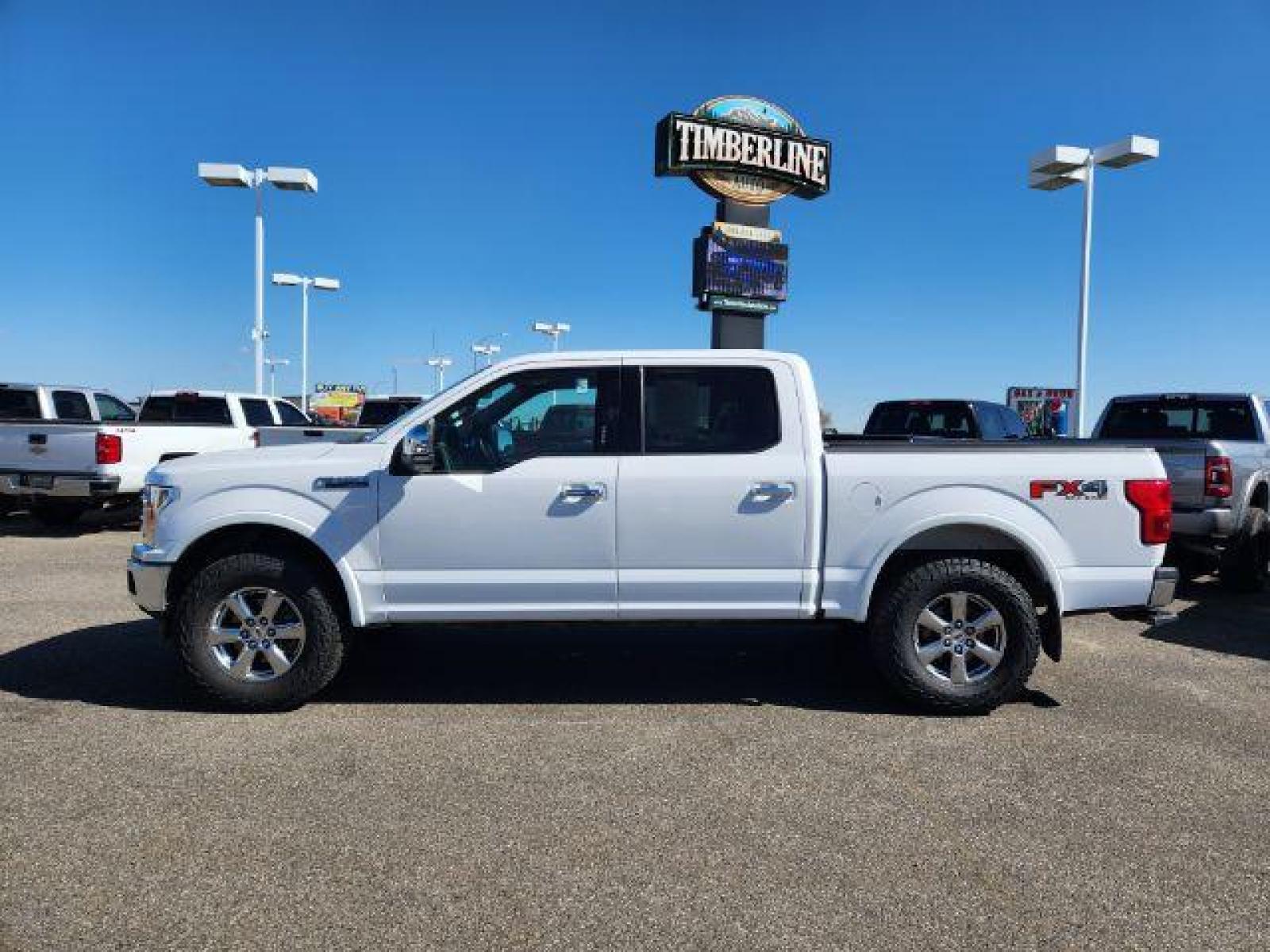 2018 White Platinum Metallic Tri-Coat /Medium Earth Gray, leather Ford F-150 Lariat SuperCrew 6.5-ft. Bed 4WD (1FTEW1EG1JK) with an 3.5L V6 TURBO engine, Automatic transmission, located at 1235 N Woodruff Ave., Idaho Falls, 83401, (208) 523-1053, 43.507172, -112.000488 - The 3.5L EcoBoost is an absolute powerhouse with 375 Horsepower, 470 torque, and a max towing capacity of 14,000lbs! This truck and all its power can still achieve up to 17 MPG in town and up to 23 MPG out on the highway! Not only is it strong and efficient, but it also very comfortable with its 6 l - Photo #2