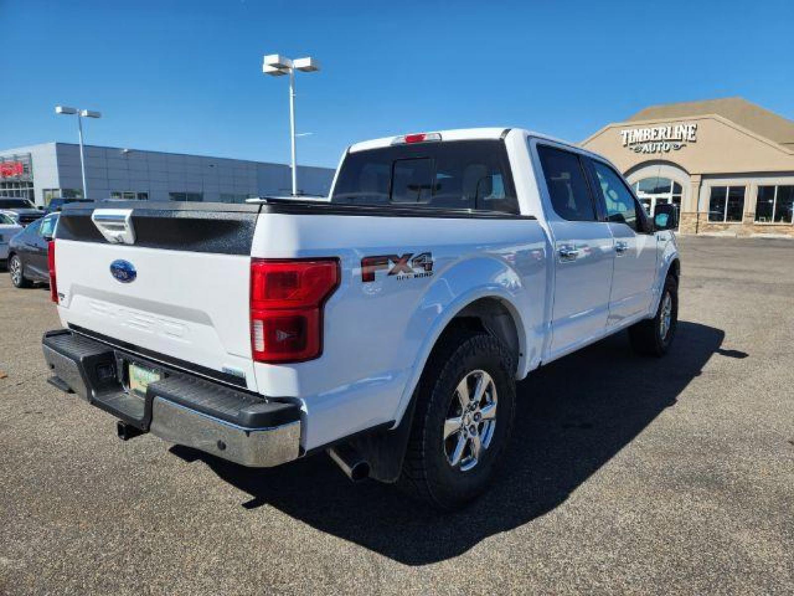 2018 White Platinum Metallic Tri-Coat /Medium Earth Gray, leather Ford F-150 Lariat SuperCrew 6.5-ft. Bed 4WD (1FTEW1EG1JK) with an 3.5L V6 TURBO engine, Automatic transmission, located at 1235 N Woodruff Ave., Idaho Falls, 83401, (208) 523-1053, 43.507172, -112.000488 - The 3.5L EcoBoost is an absolute powerhouse with 375 Horsepower, 470 torque, and a max towing capacity of 14,000lbs! This truck and all its power can still achieve up to 17 MPG in town and up to 23 MPG out on the highway! Not only is it strong and efficient, but it also very comfortable with its 6 l - Photo #5